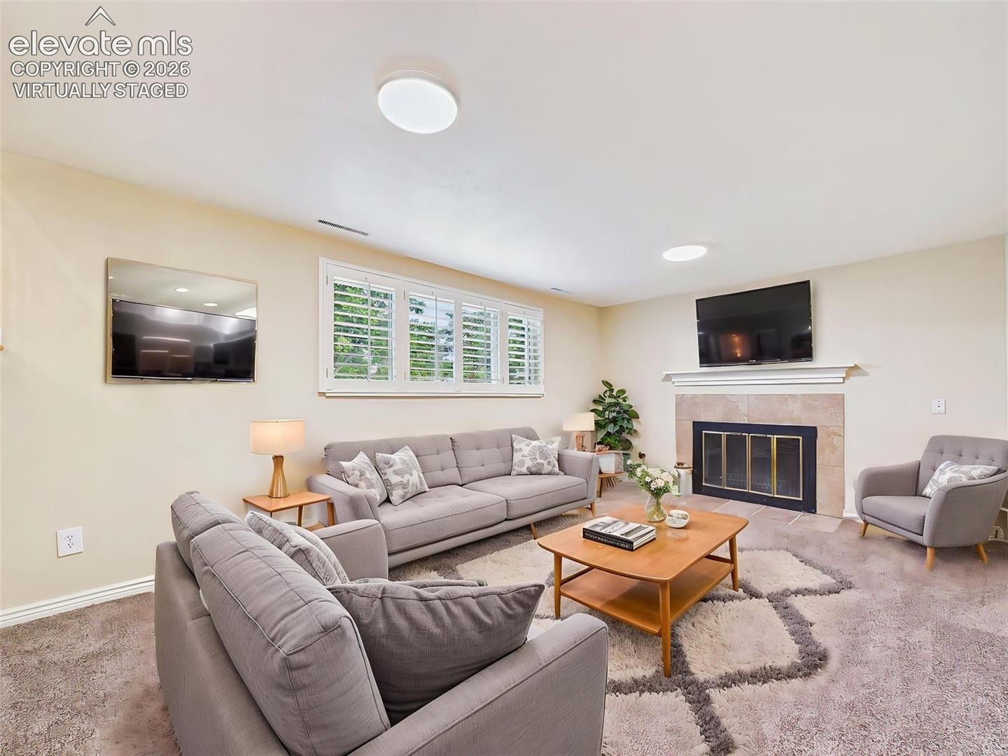 (Virtually Staged) Family Room – Virtually staged to showcase the room’s generous proportions and inviting layout, ideal for everyday living or entertaining.
