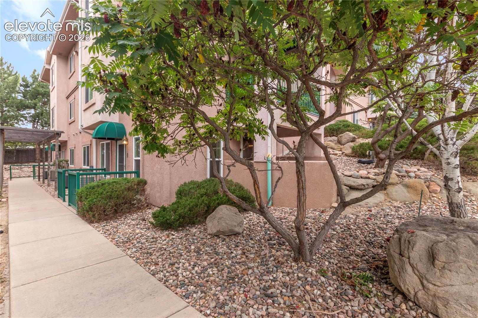 Walkway to Fenced Patio
