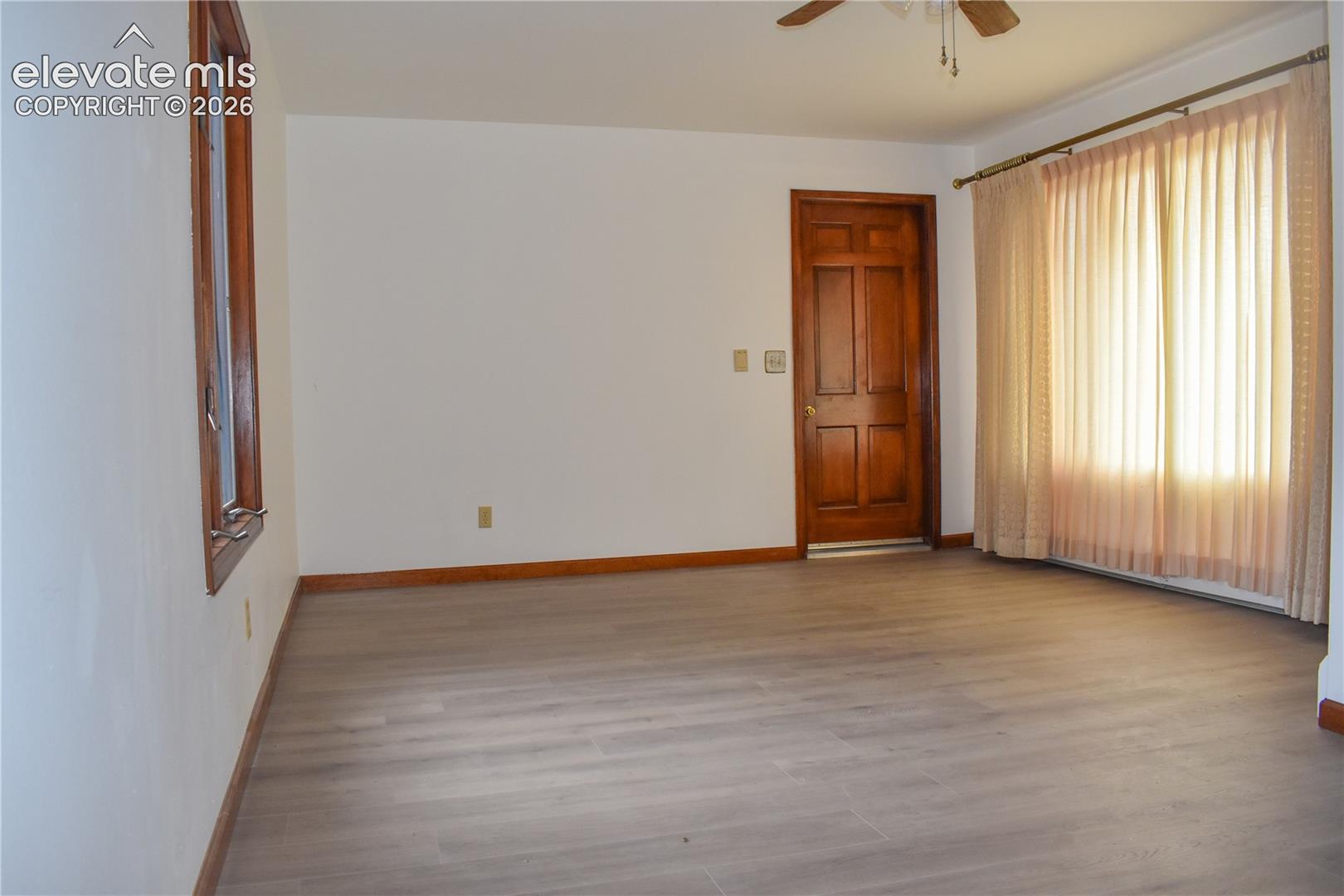 Wood-finish flooring with coordinating wood trim