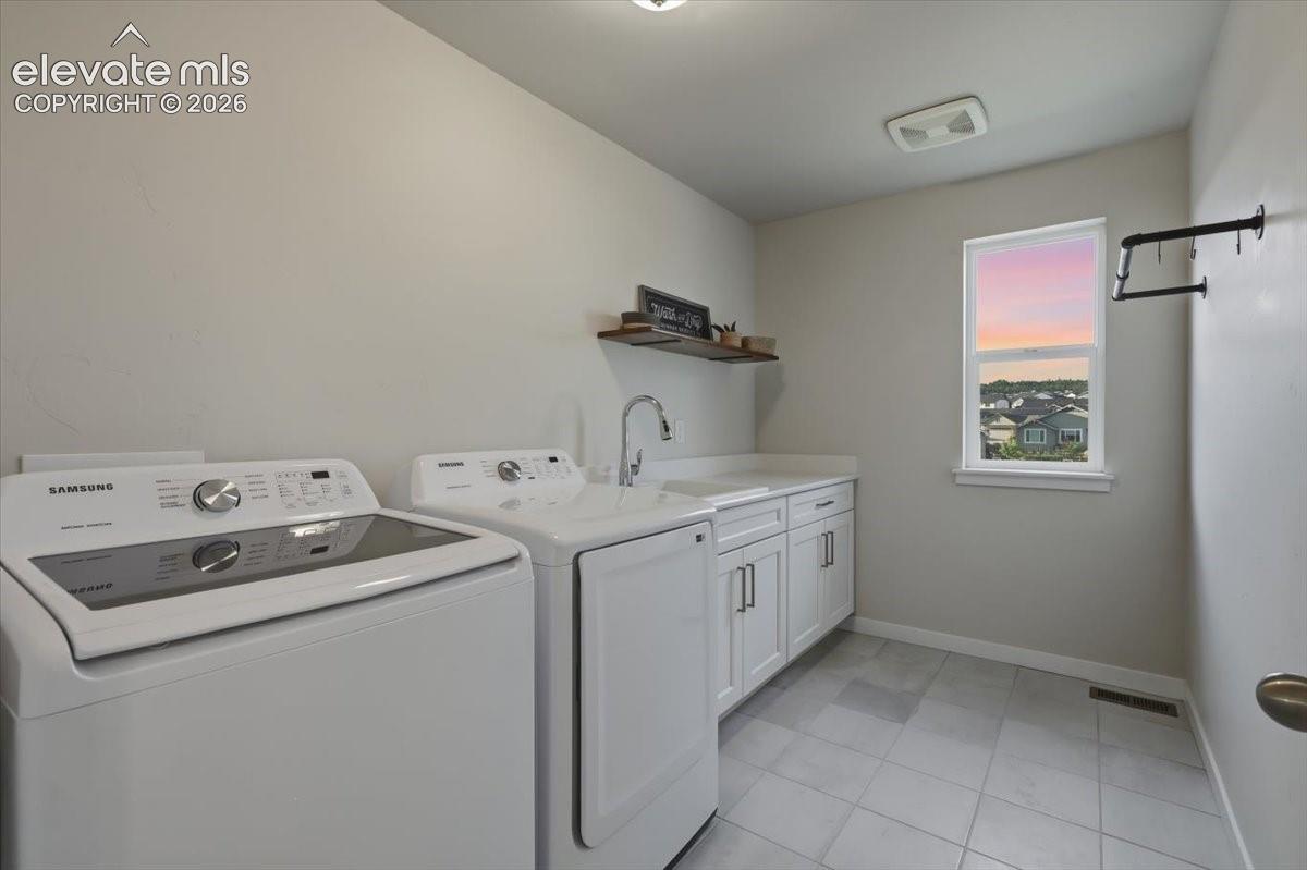 Spacious Laundry w/ sink and folding table 