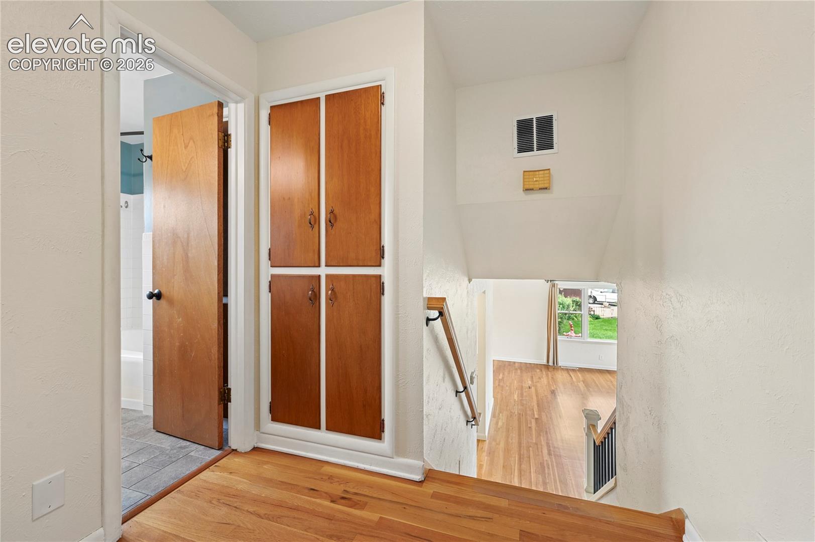 Upper Level Hallway (Looking From Bedrooms to Bathroom & Stairs)