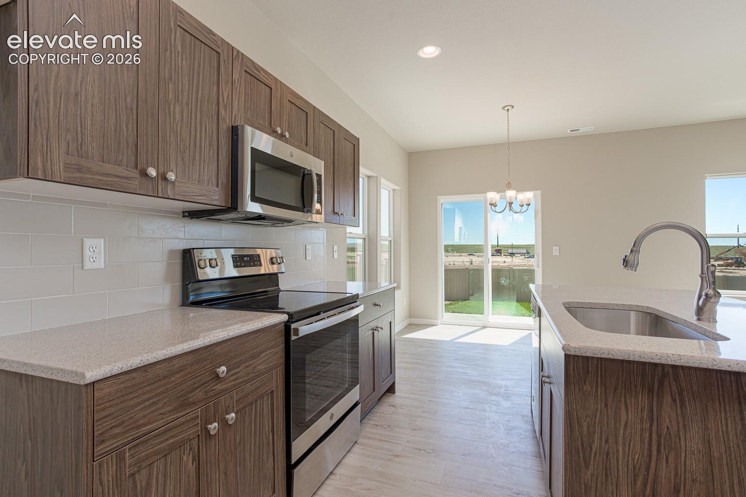 *photos of previously built home of same floor plan*
