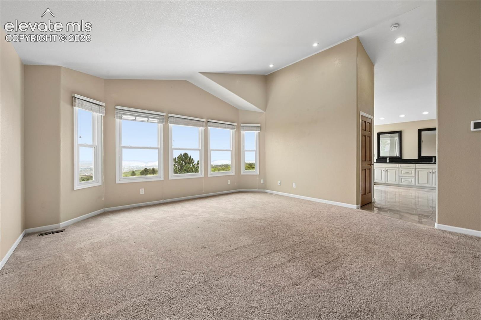 Primary bedroom overlooking the city!  