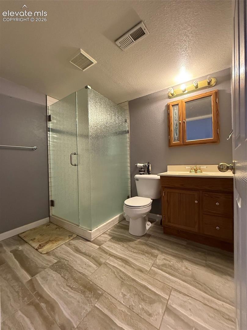 Bathroom w shower in the basement