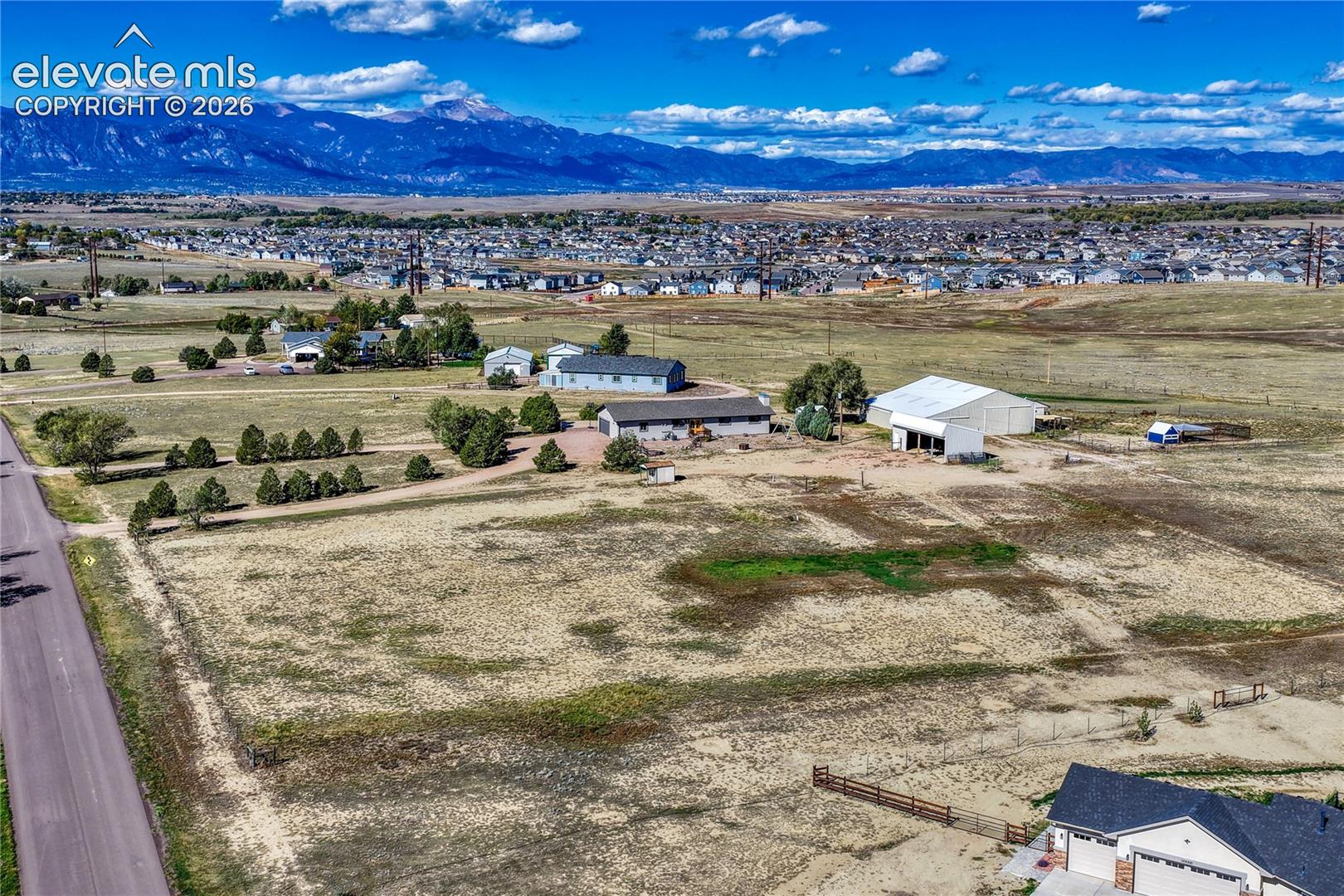 5.64 acres with tree-lined driveway