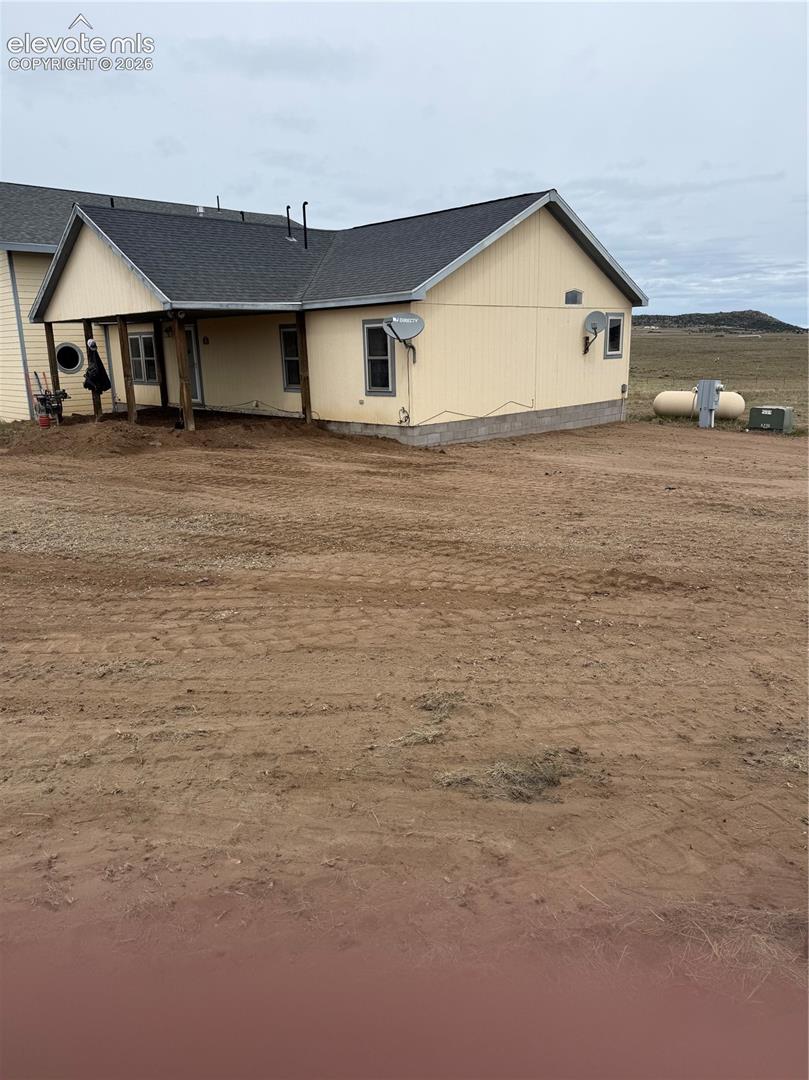 Exterior siding with a covered porch entry