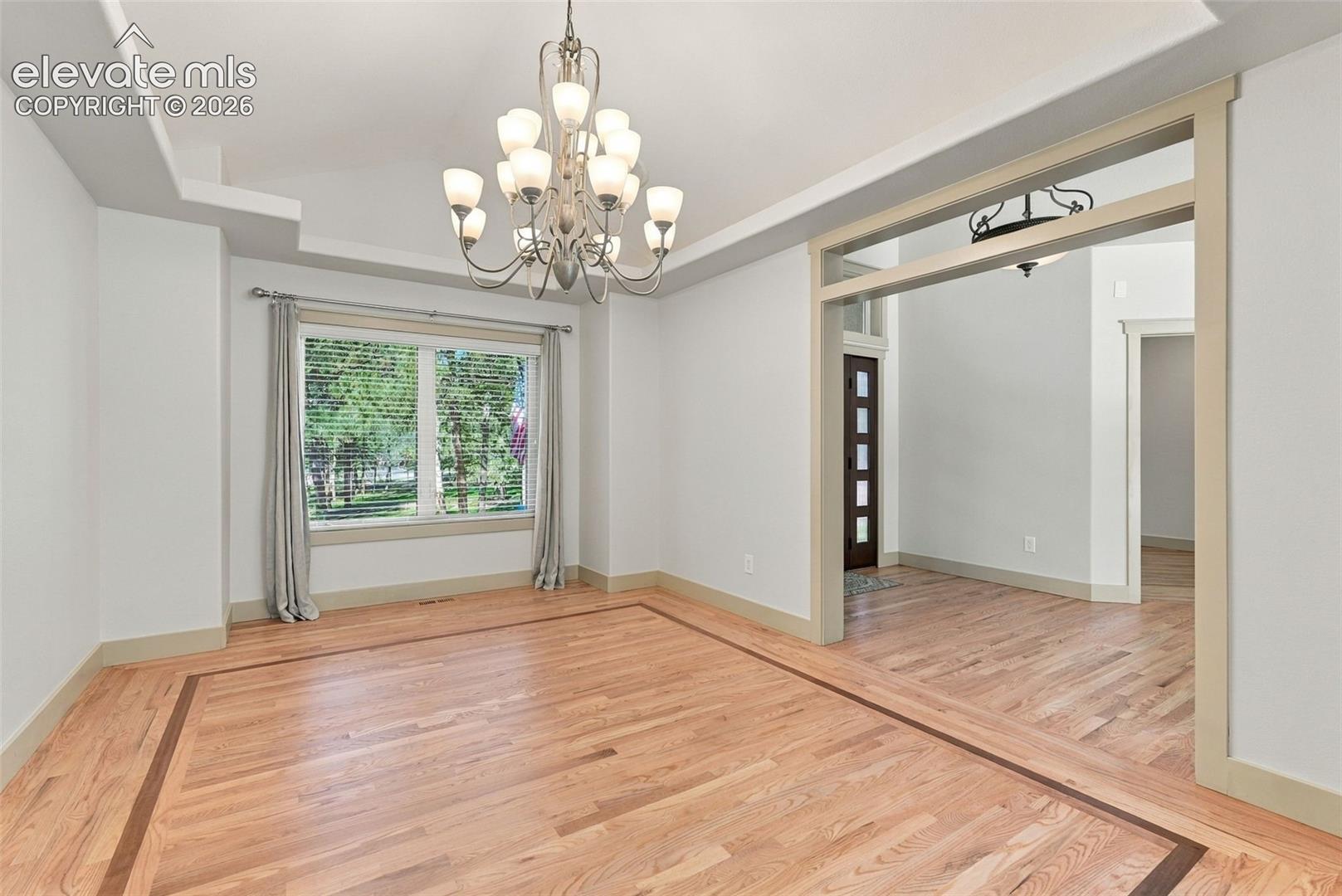 Formal dining room with tray ceilings