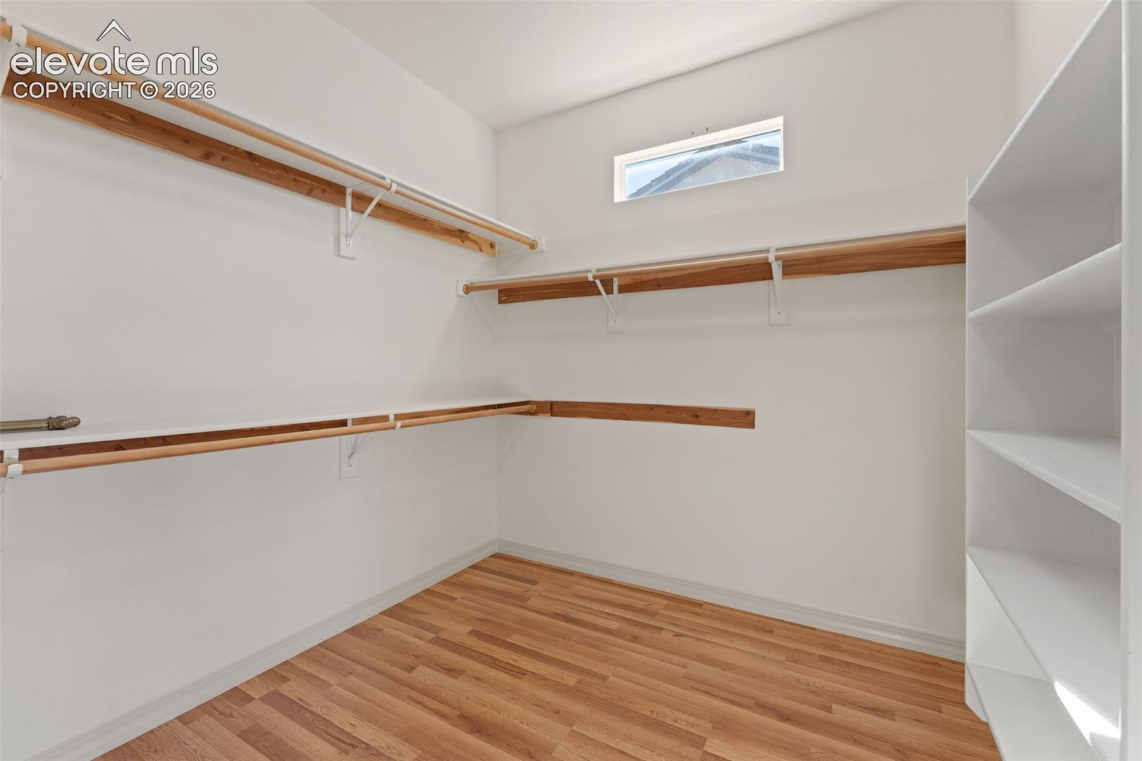 Extra Large walk in primary closet.