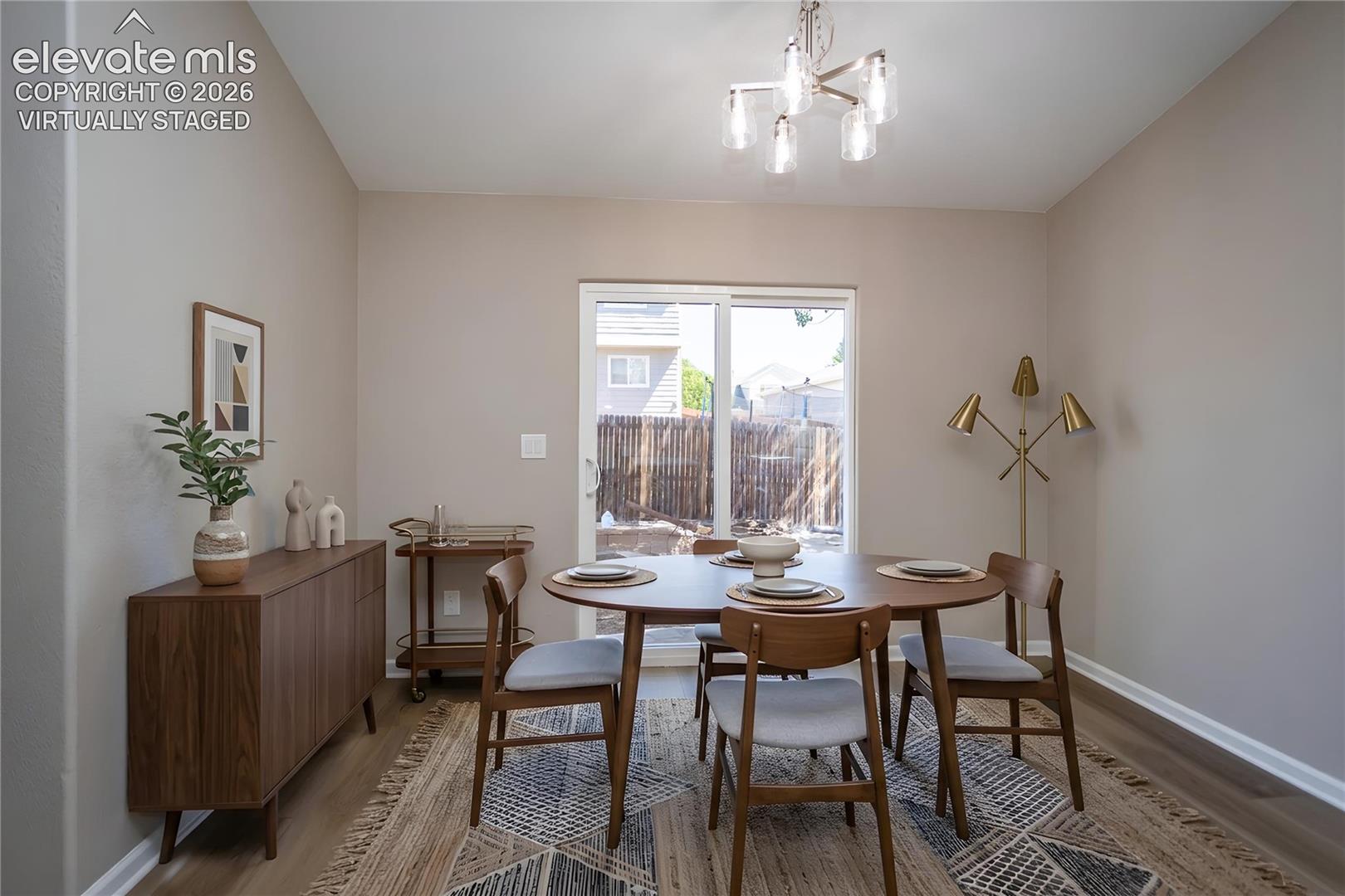 Virtually Staged Dining Area - lots of room for family & friends!