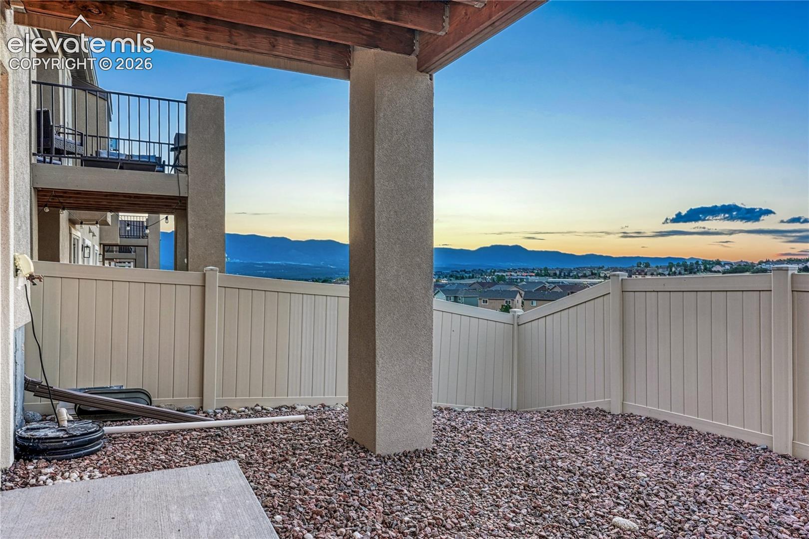 Relax outdoors while taking in sweeping mountain and sunset views from the comfort of the covered back patio.