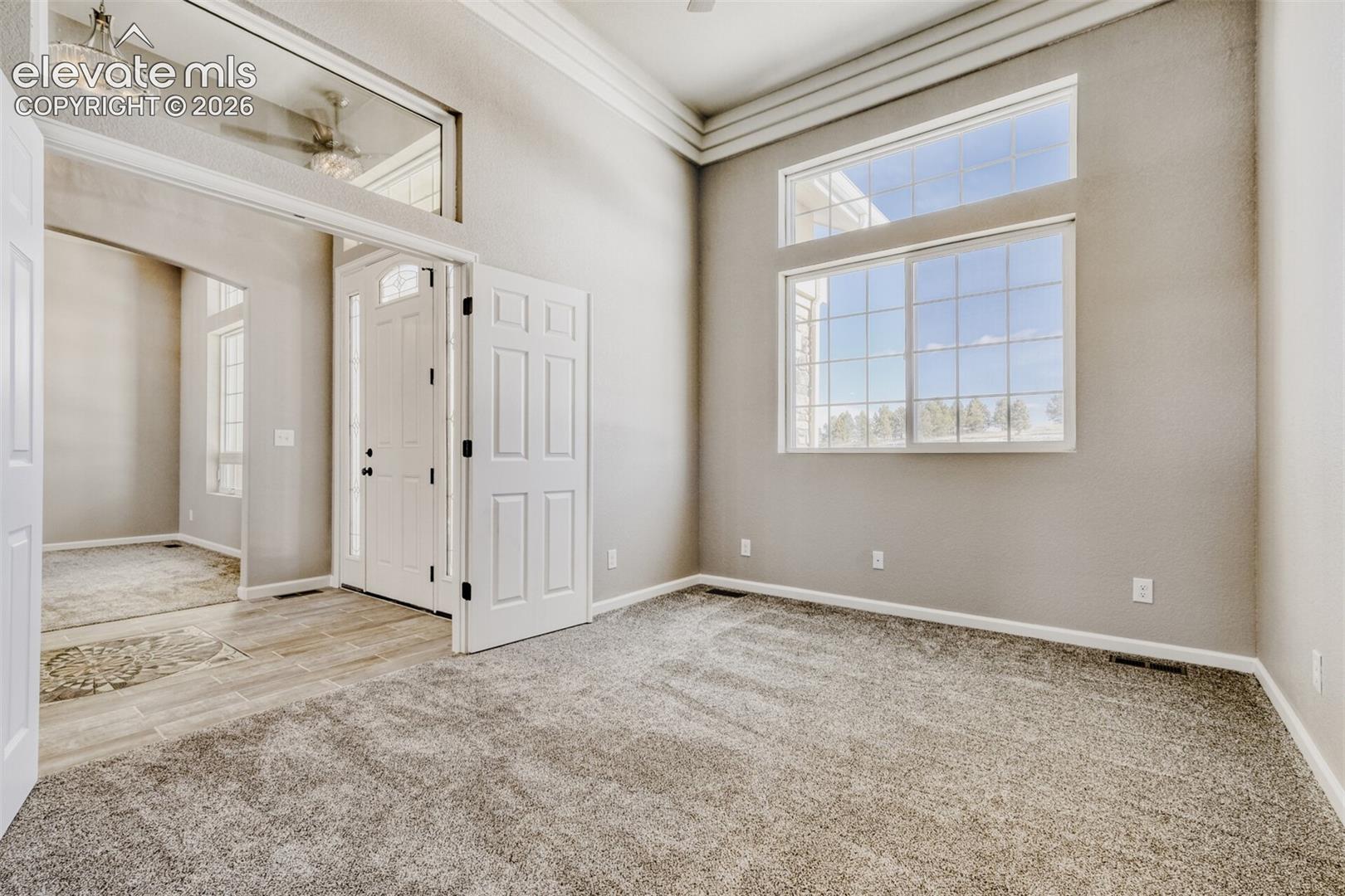 Secondary Bedroom #1 or Office off the front door with full bath.