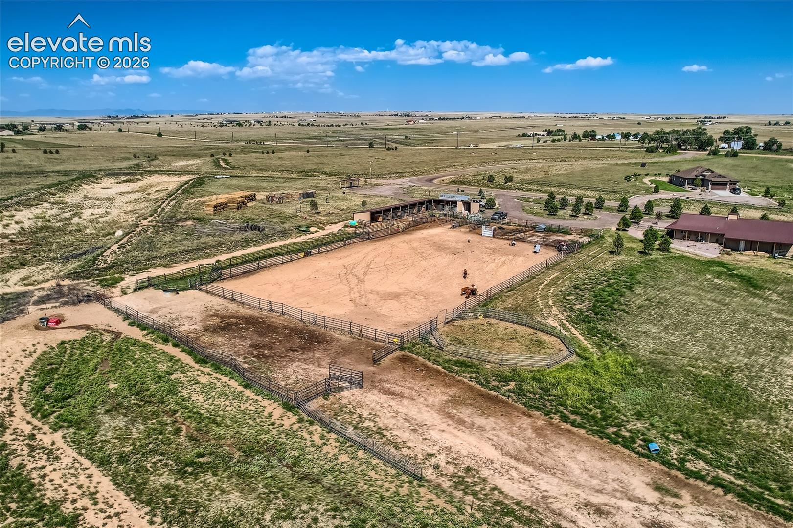 COMMUNITY BARN, ARENA & STALLS.