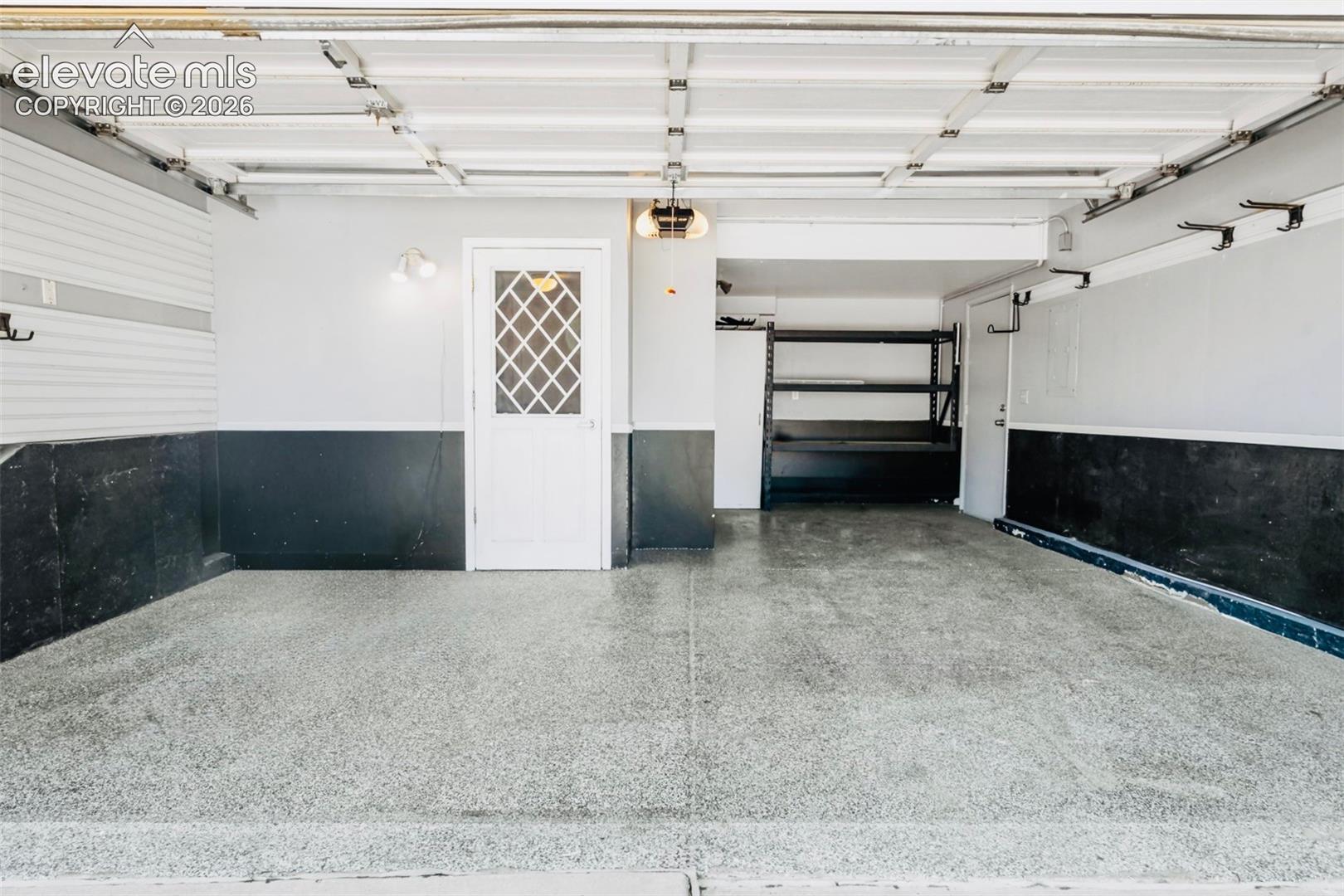 Completely Finished Garage with Walkout Access Door.