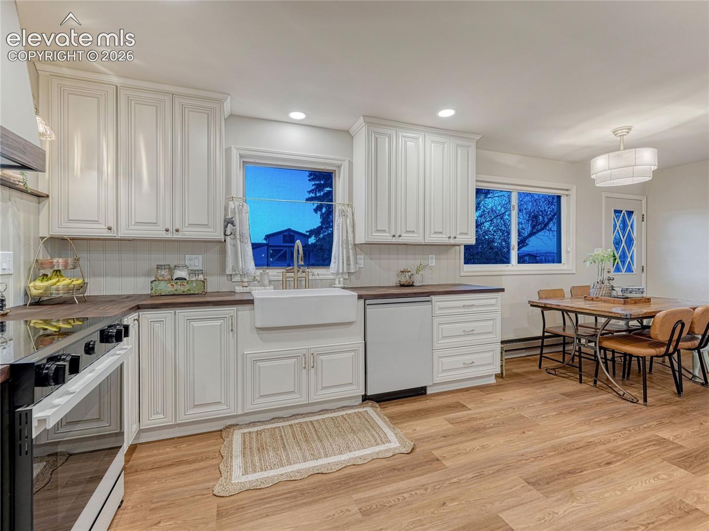 Apron sink, custom backsplash, pull out cabinets for trash, seasonings, pots and pans.
