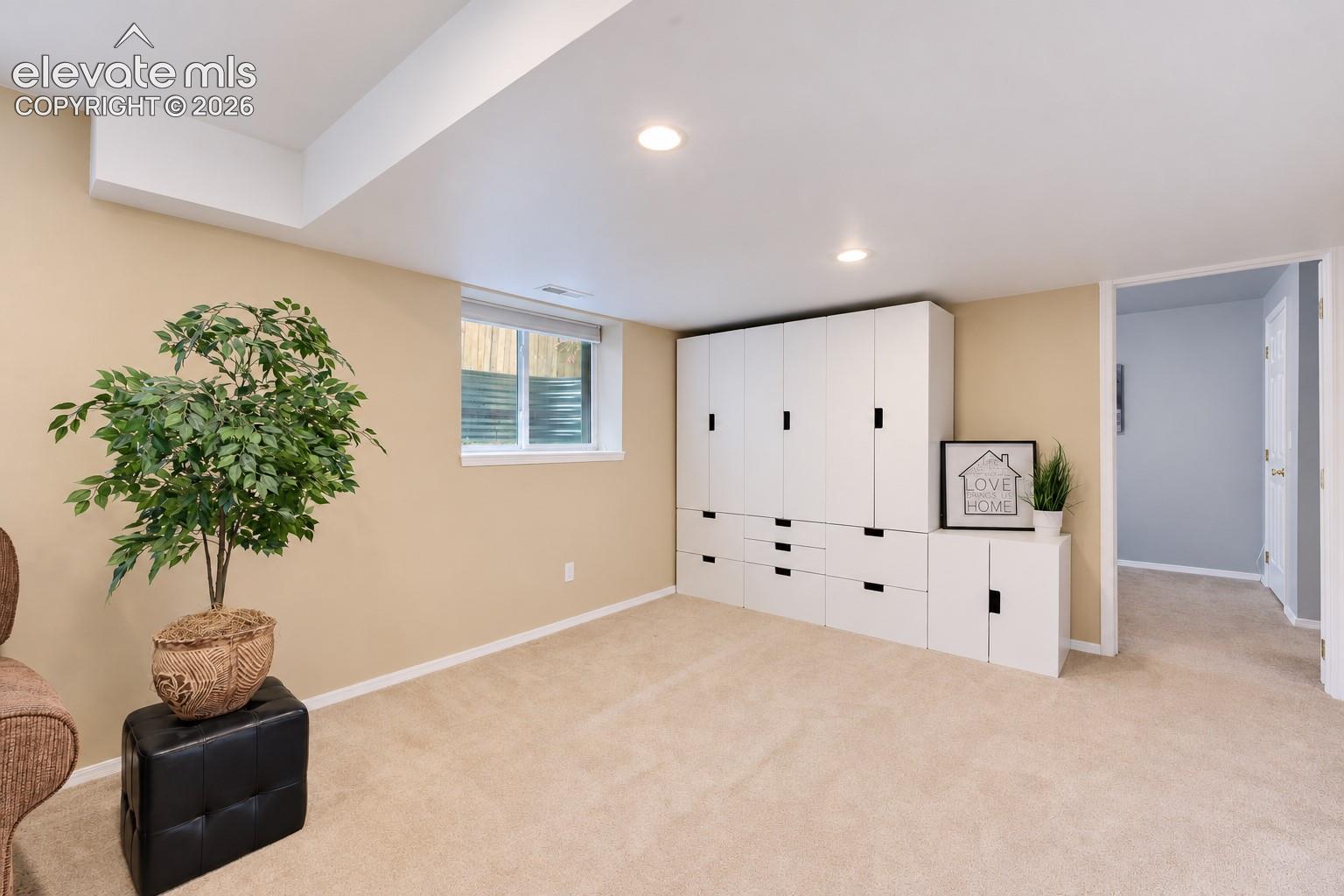 Attached storage cabinets in Basement Family Rec Room