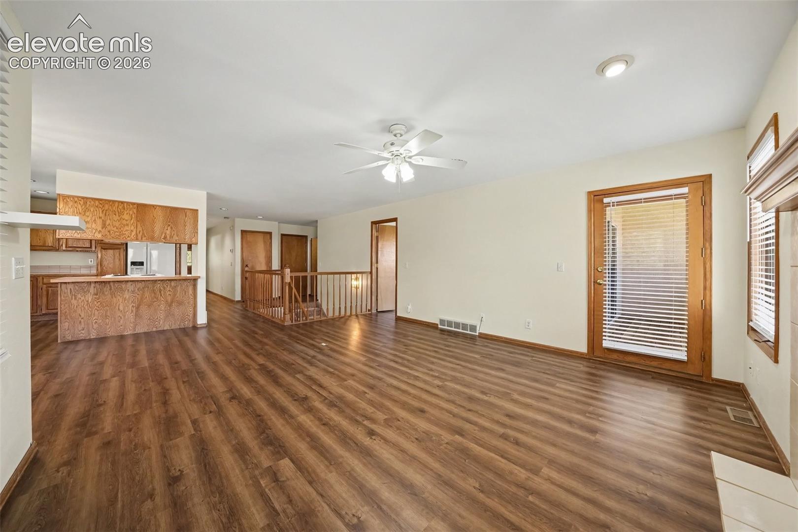 New paint and LVP flooring throughout, recessed lighting, and a ceiling fan