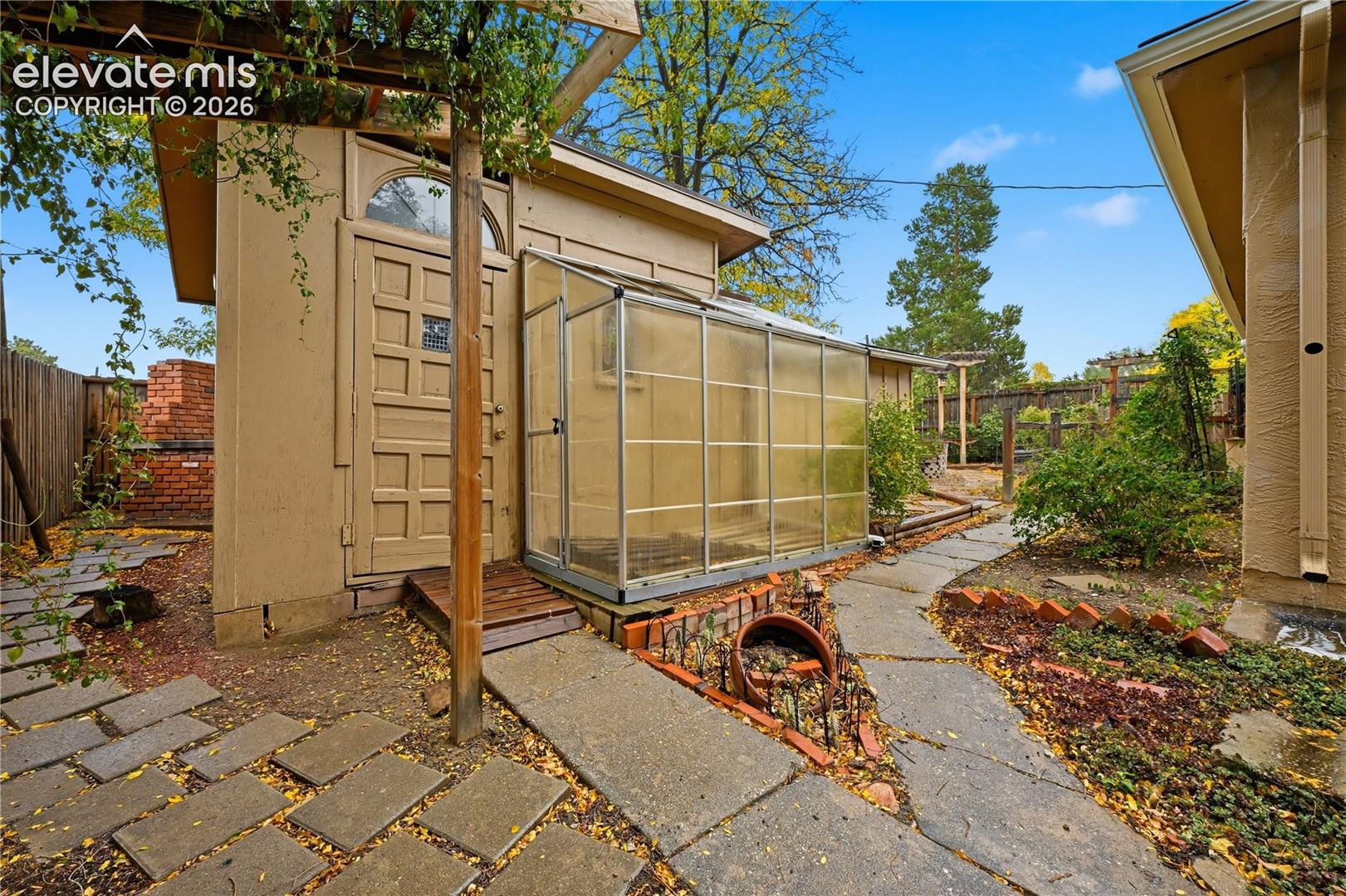 The garden shed with greenhouse. 