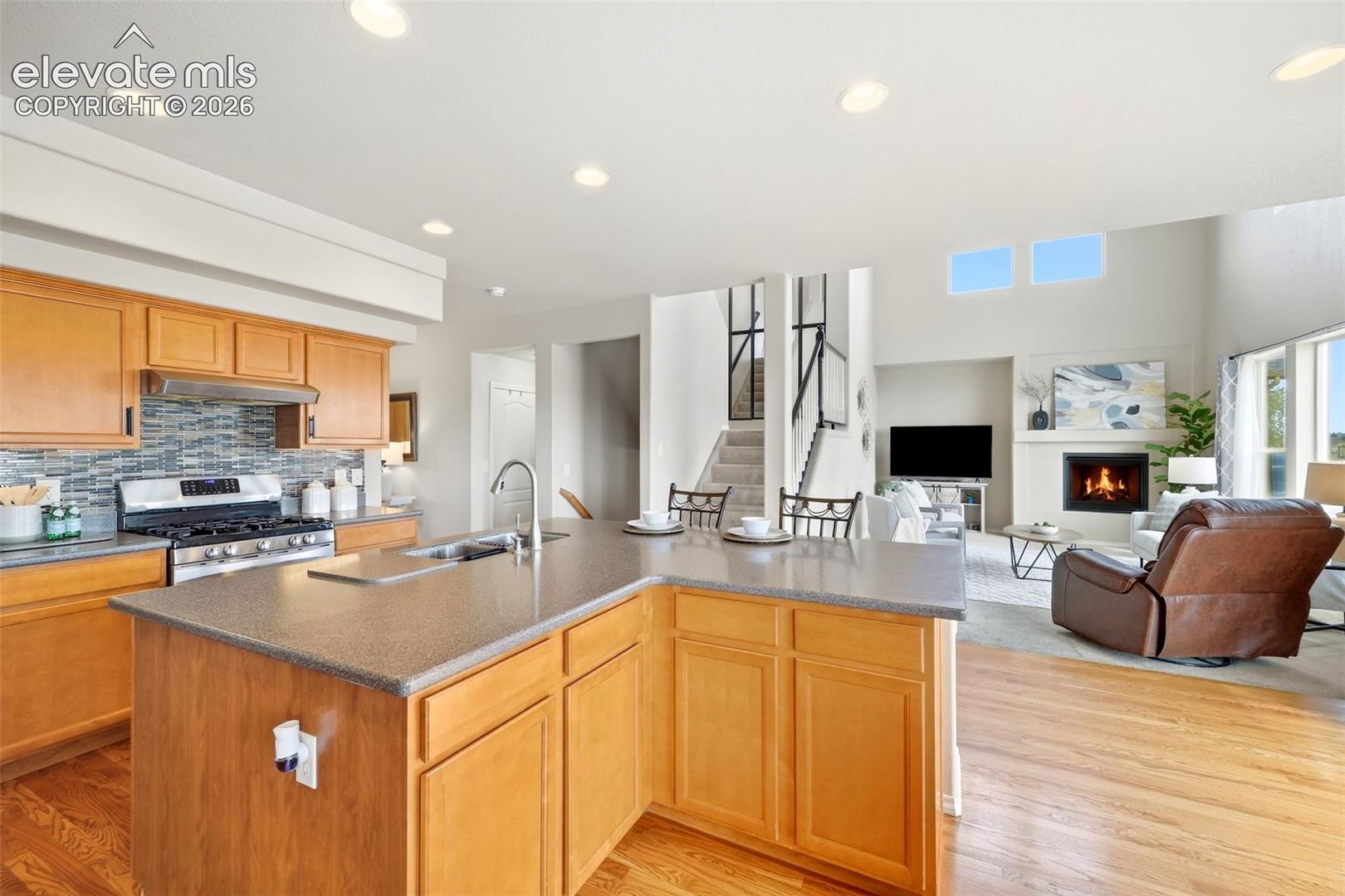 Eat in Kitchen with SS appliances, butlers pantry and hard wood flooring