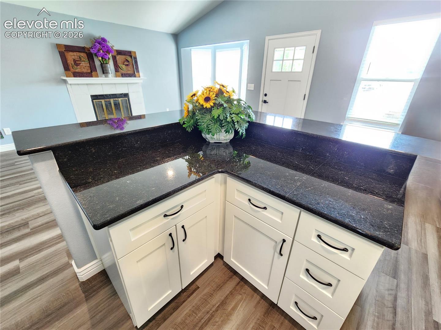 Functional L-shaped counter space designed for effortless meal preparation