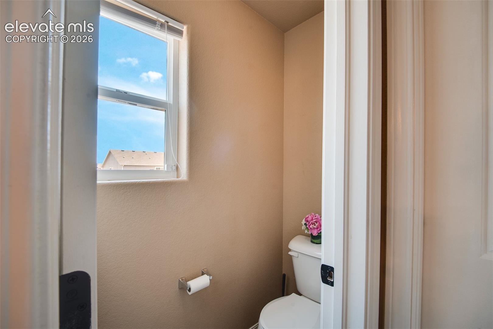 The 5-Piece Primary Bathroom includes a tile floor, dual sink vanity, separate shower. and soaking tub.
