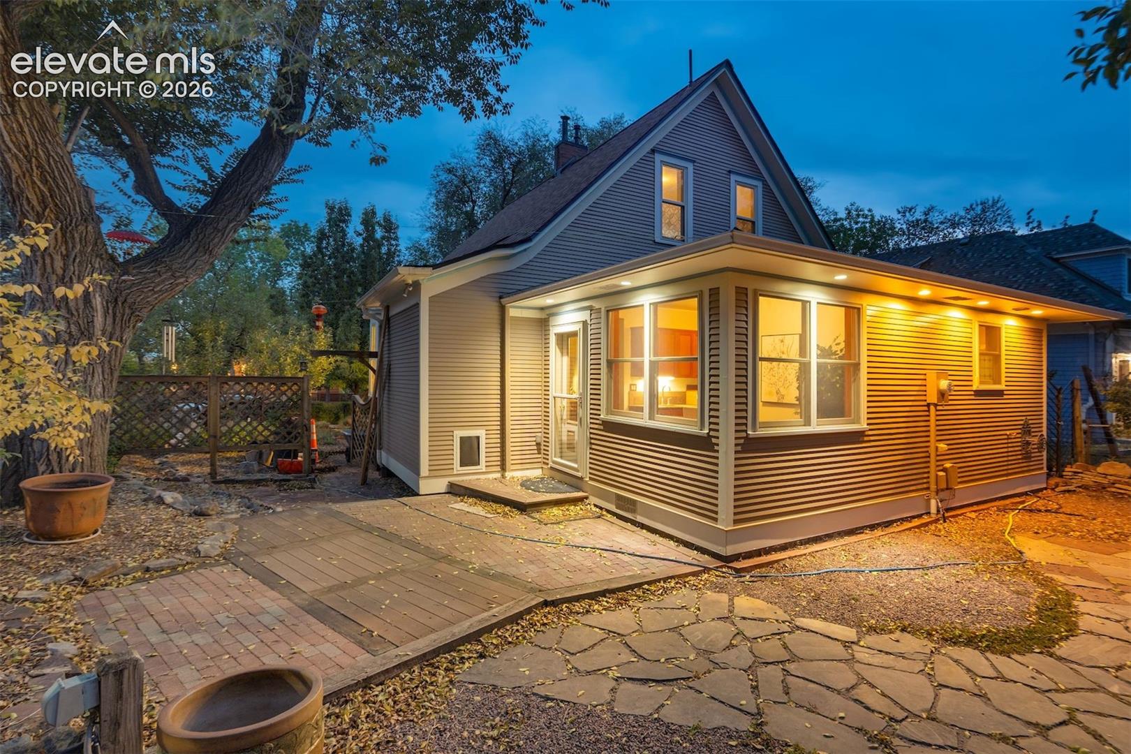 Hardscaping featuring a mix of flagstone and brick pavers