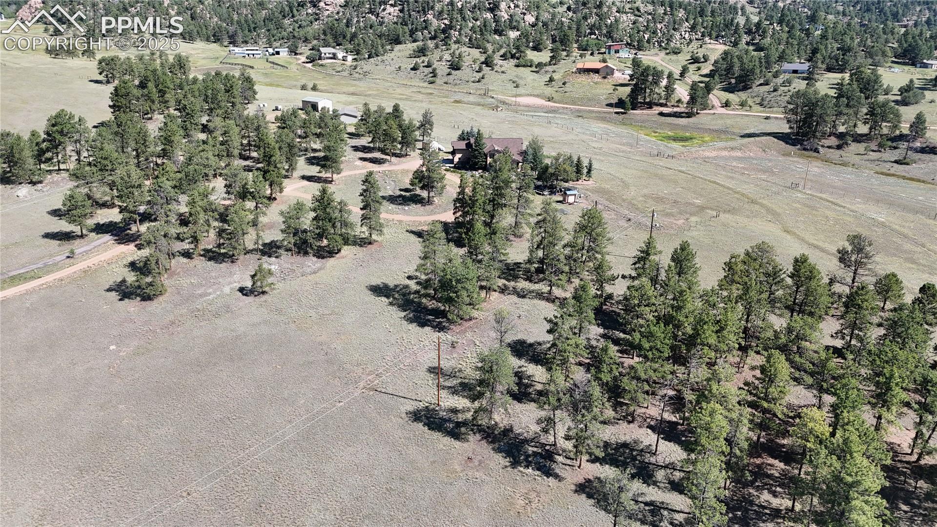 Aerial overview of property's location featuring rural landscape