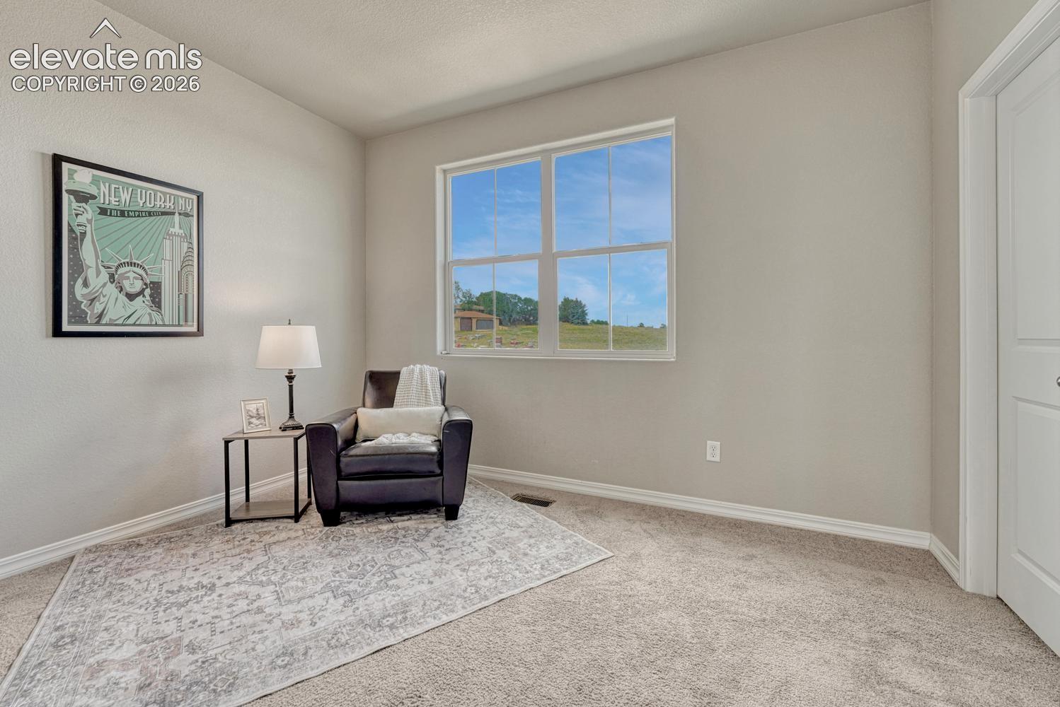 Upper level Bedroom #2 has neutral carpet, private access to the Full Bathroom, and walk in closet.