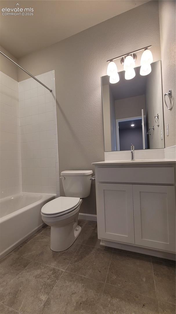 Full Bathroom on upper level with quartz countertop and tile surrounds! 