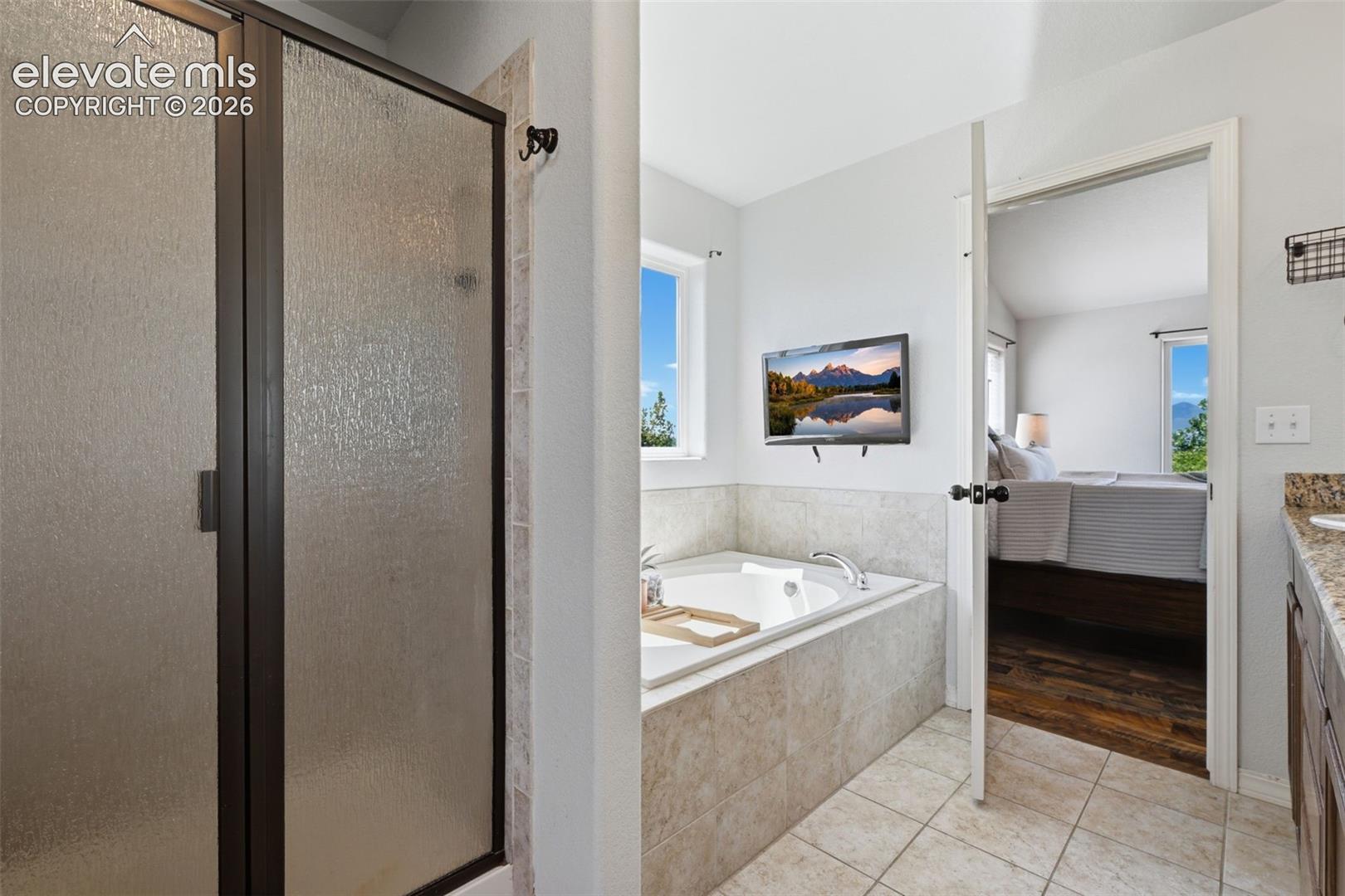 Spa like master bath with included TV!