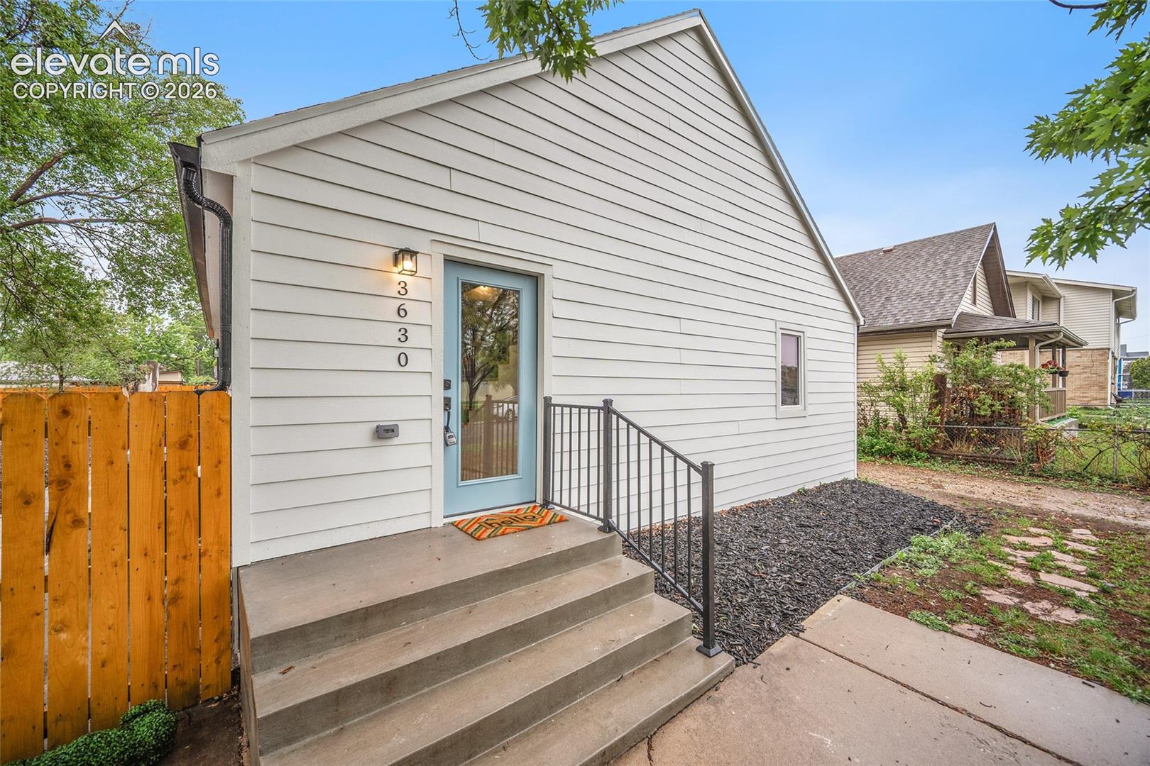 Beautifully remodeled with a clean, modern aesthetic, this light-filled home offers the perfect blend of style and comfort just under a mile from Garfield Lake Park. Step inside to an airy, open-concept layout ideal for both everyday living and entertaining. The sleek and stunning kitchen featuring stainless steel appliances, stone countertops, modern fixtures, and abundant cabinetry for storage. Two bedrooms are conveniently located on the main level, along with tastefully updated bathrooms showcasing elegant marble tile finishes. Upstairs, you’ll find a cozy retreat complete with a spacious bedroom and a 3/4 bathroom featuring dual sinks and a large walk-in shower with a built-in bench. Enjoy the generously sized, fully fenced backyard with mature trees and plenty of space to relax or entertain. A detached garage adds convenience and extra storage. With new paint, carpet, fixtures, and appliances throughout, this move-in ready home delivers a fresh, modern feel in every detail.