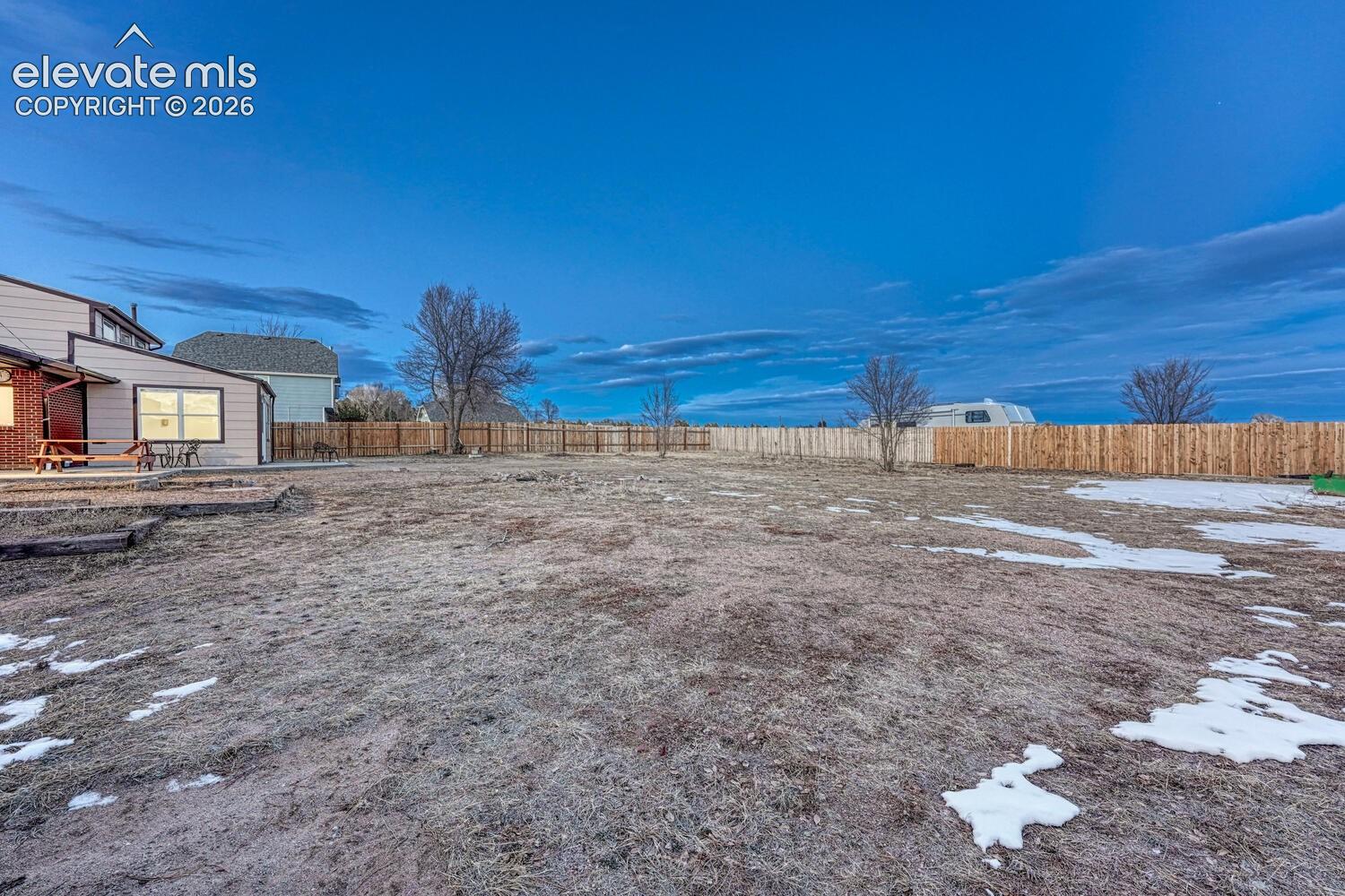 A portion of the 2.5 acres has a privacy fence but the property goes beyond the fence.