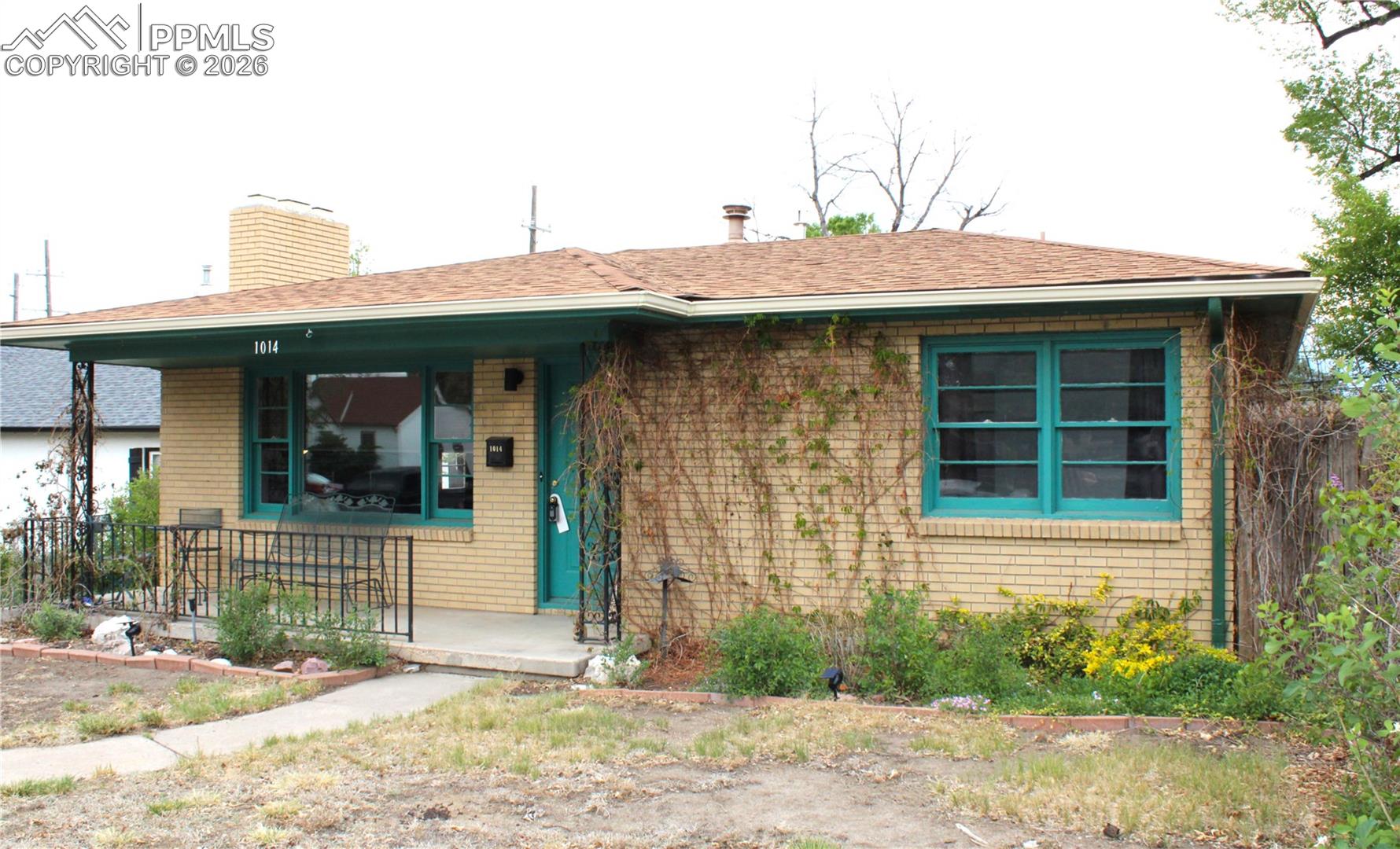 You will feel so comfortable the minute you open the door to this adorable little rancher!  The living area is warm and cozy with a gas fireplace, new carpeting and fresh paint.  The home comes complete with a new electrical panel, new hot water heater, new kitchen counters, new dishwasher, new stove, new sink and new flooring!  Everything is on the same level including the laundry room off the kitchen.  The rear of the property has 3 parking spaces- a 2-car garage AND an attached carport big enough for the larger trucks.  A space/room attached to the garage would be perfect for a potting shed, storage, or possible pottery studio.  It is walking distance to Queen Palmer elementary and shopping is close by.  It will be worth your while to take a look at this cute home.