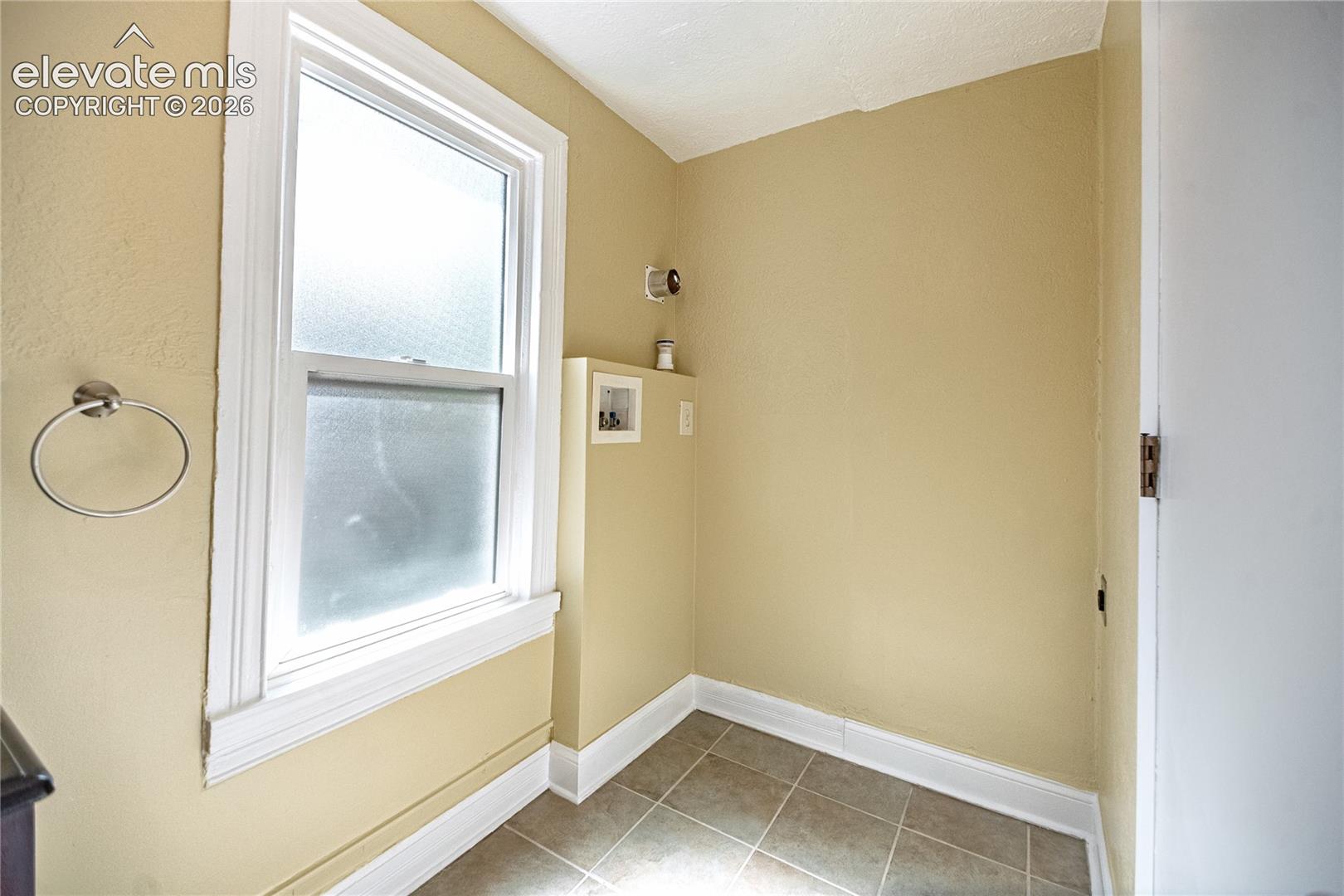 Laundry hook-ups in bathroom