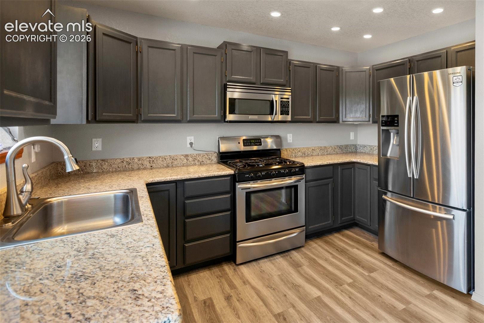 Kitchen with walk out. 