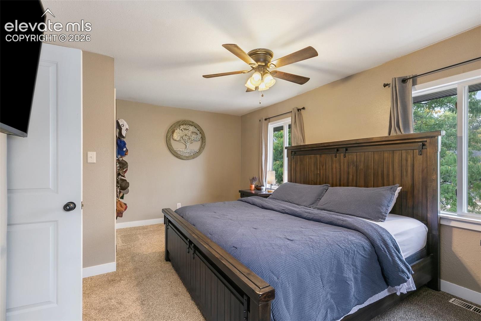 Large primary bedroom with additional space to spready out, and 2 large closets.