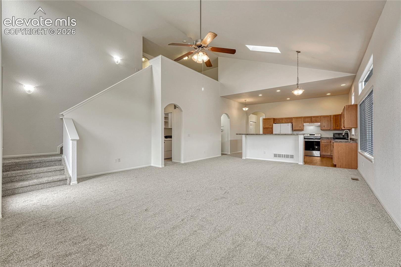 Great room, dining space and kitchen. 