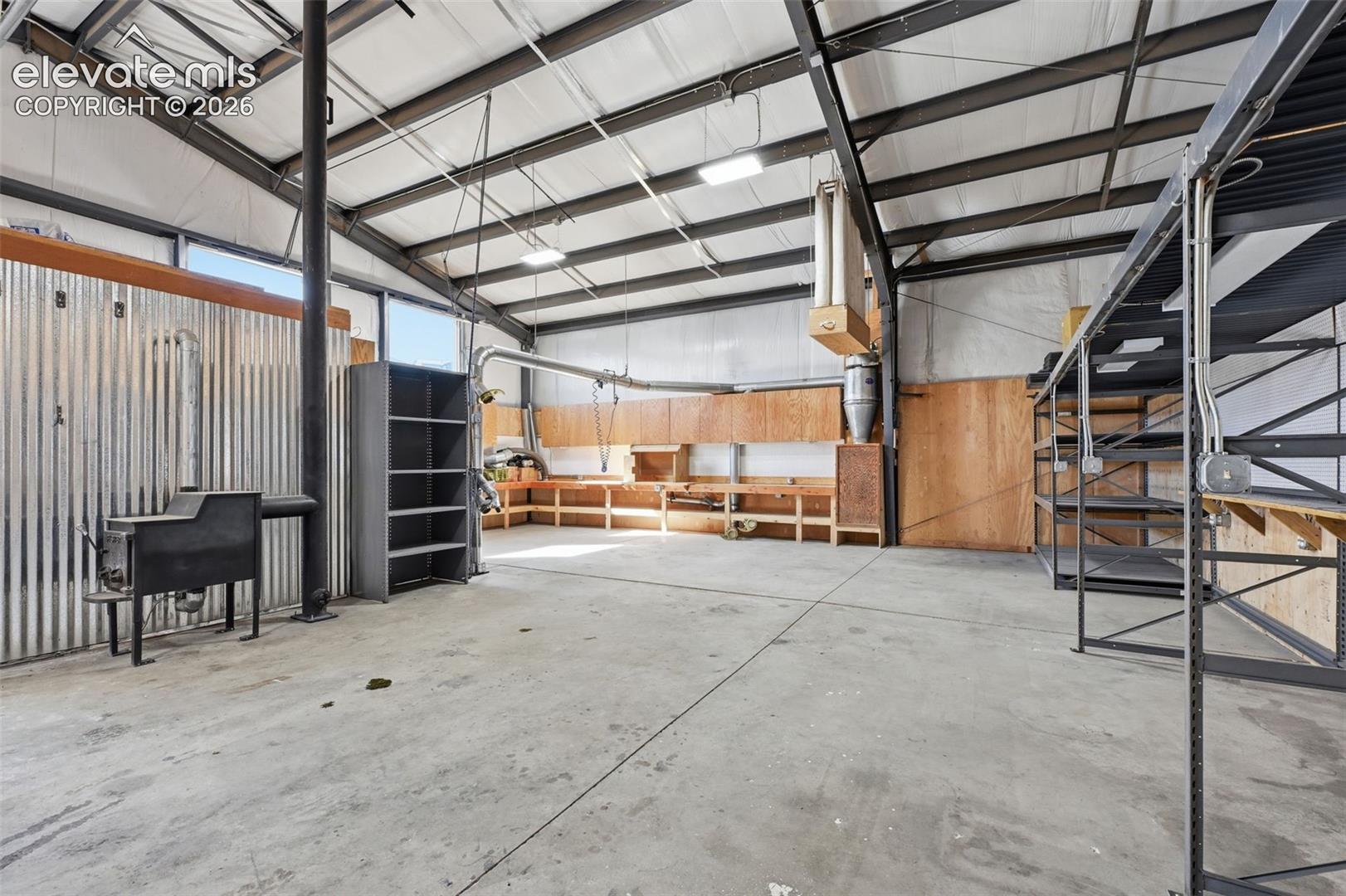 Lighting: LED lighting throughout creates bright, usable workspace