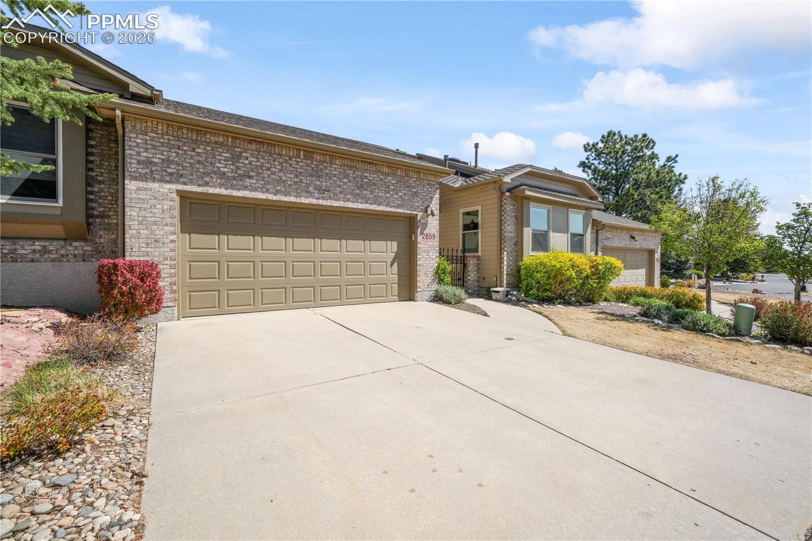 Front of home with 2 car garage