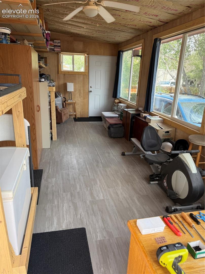 Inclosed 200 sq ft front porch with amazing large picture windows.