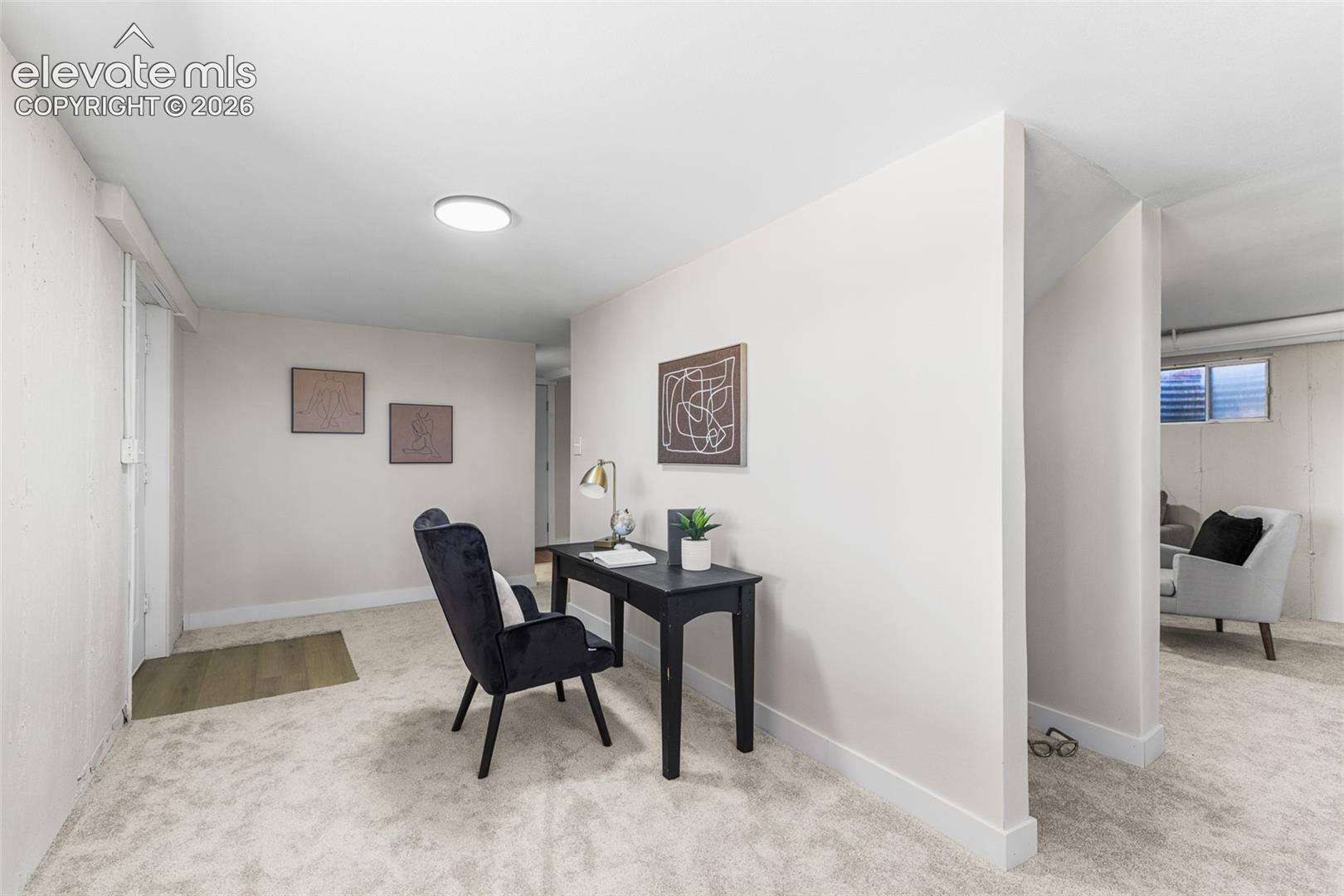 This space in on the other side of the family room. Perfect for a play area, office, or exercise equipment
