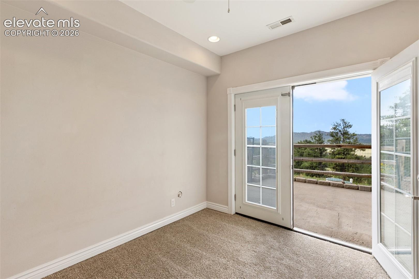 French doors off of primary bedroom