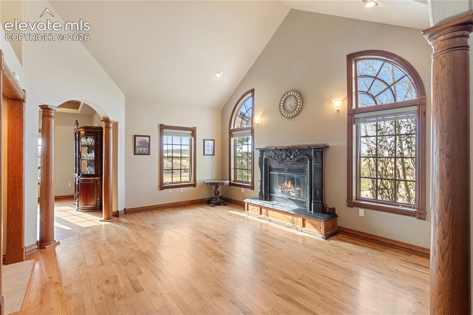 Living room with fireplace, dining room off to the left