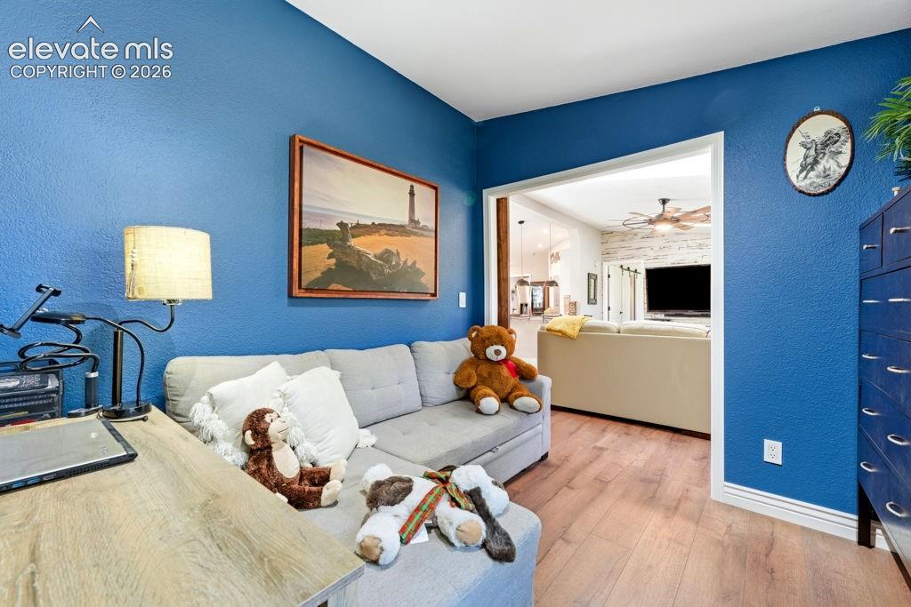 Wood-finish flooring throughout, can be an office or 3rd bedroom