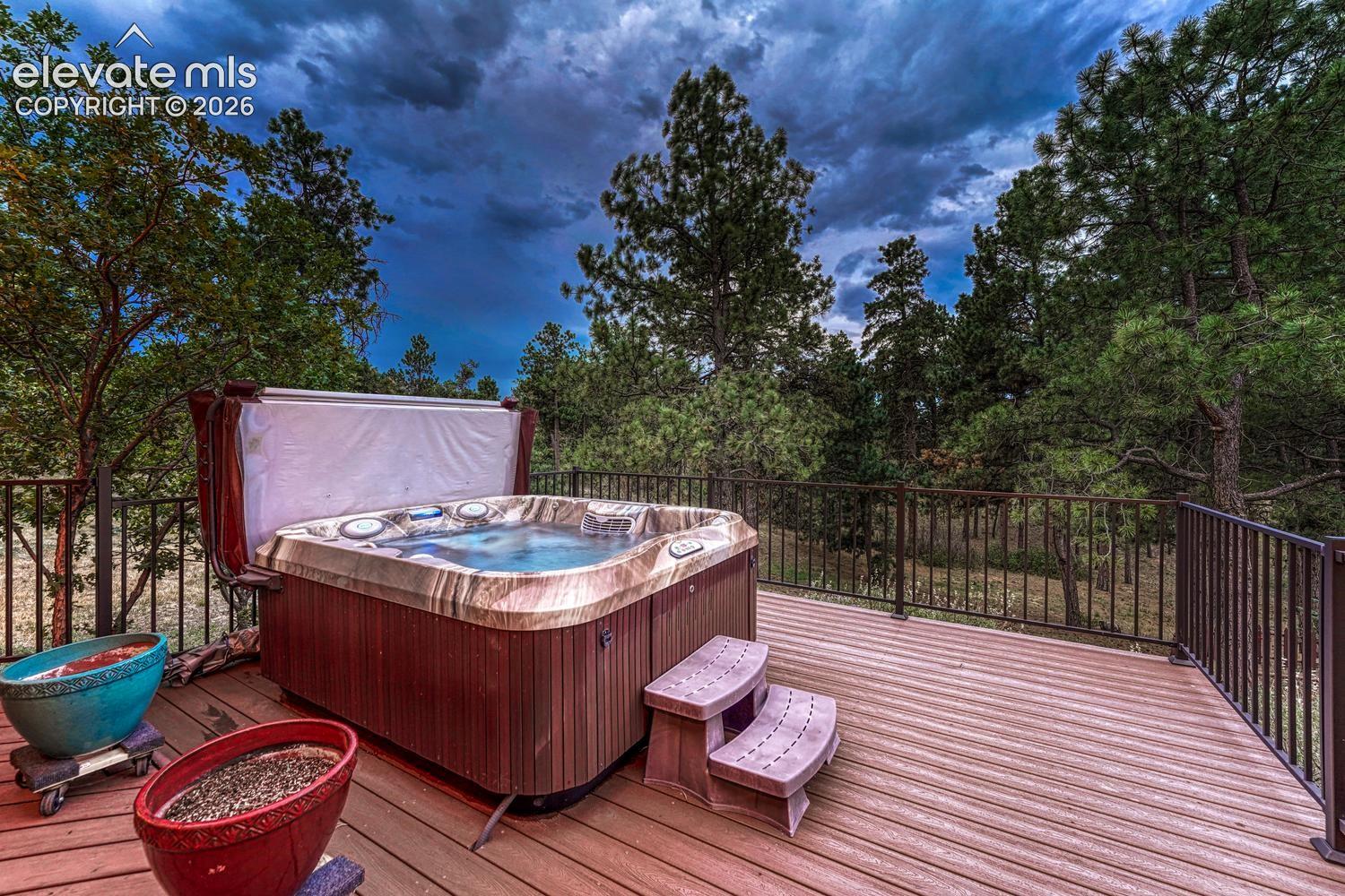 Sunset view of hot tub to enjoy after a long day's work.