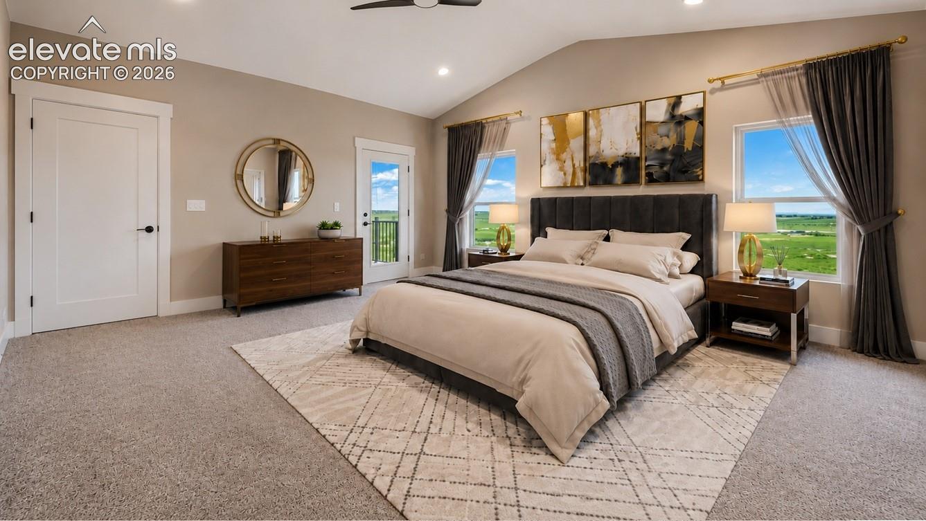 Spacious room with vaulted ceiling and recessed lighting