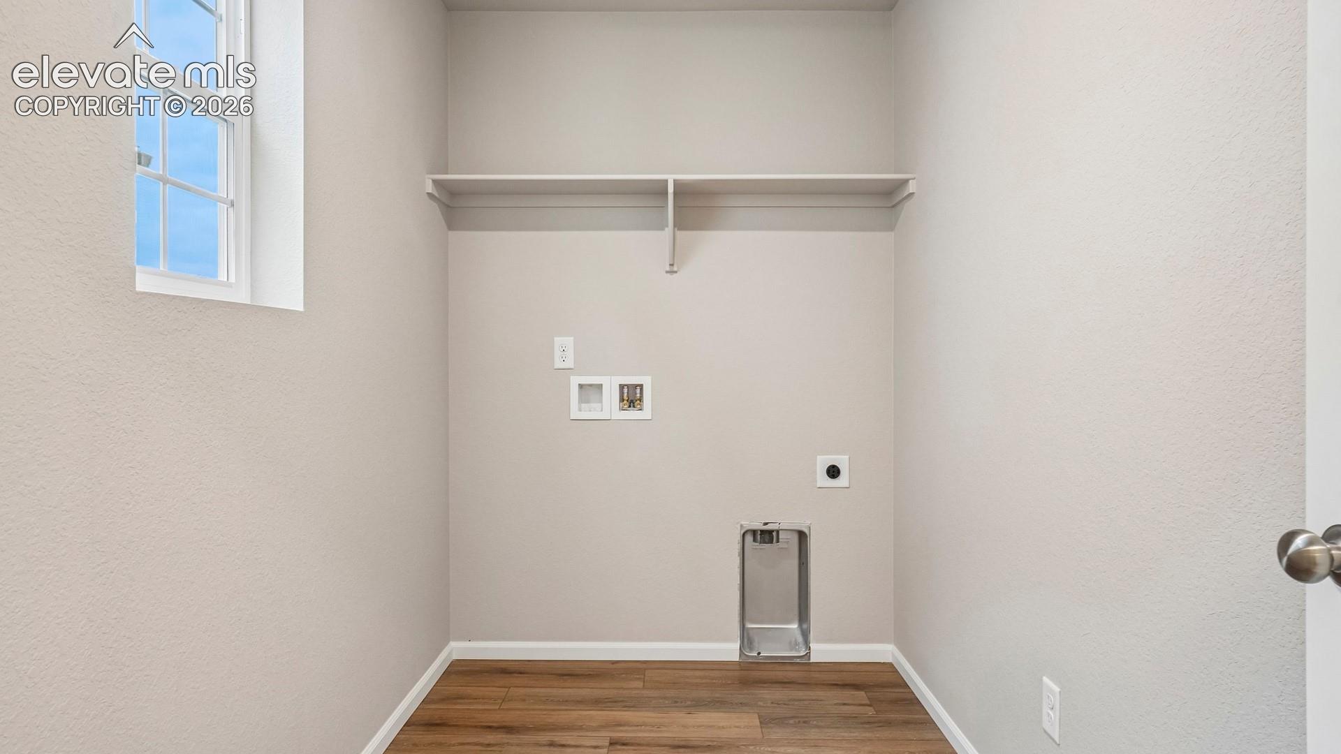 Wood-finish flooring with white trim
*photos of a model home*