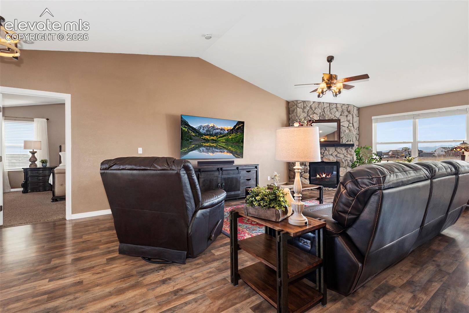 Main Level Family Room, Beautiful Stone Fireplace, Windows, Windows, Windows and the Views!!! Mountains Views, Romantic Sunsets, A Perfect space for Entertaining, and Relaxing