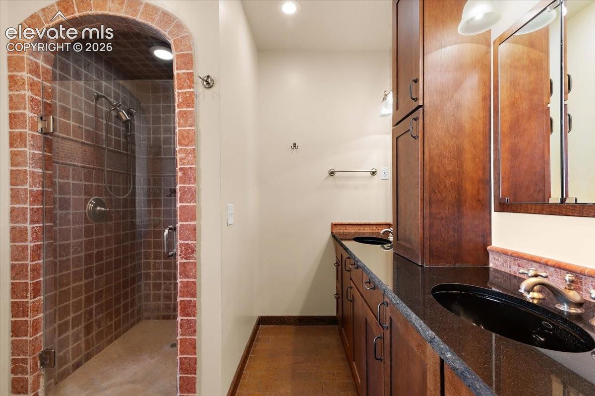 Double vanity and shower in 5 piece primary bath.
