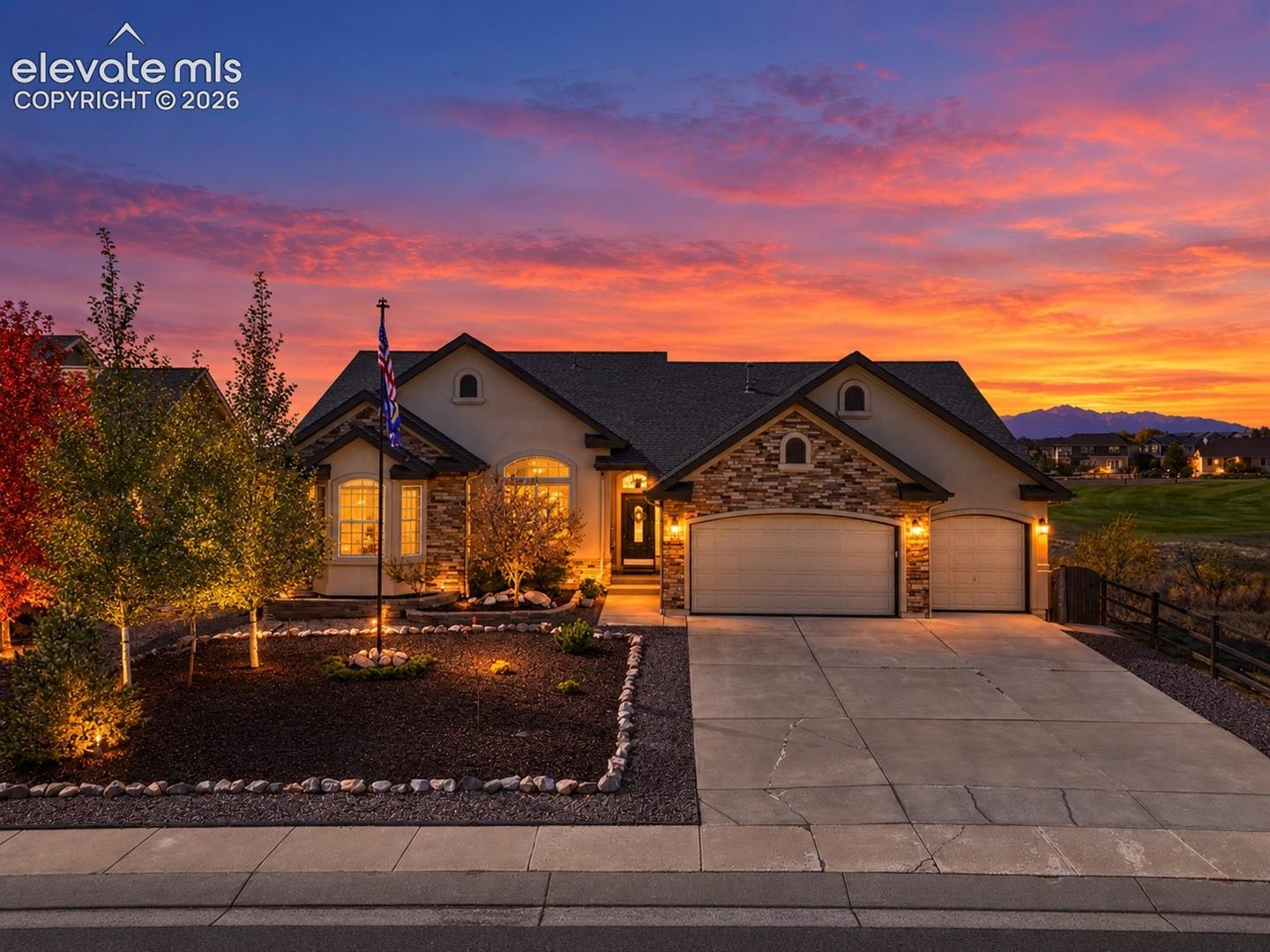WOW! This is a MUST SEE! Stunning ranch-style home offering breathtaking Pikes Peak and mountain views, backing to a golf course and open space, with additional open space on the north side for added privacy!Beautiful hardwood floors flow throughout the main level, featuring a gourmet kitchen with double ovens, granite countertops, breakfast bar, dining nook, pantry, and an abundance of cabinetry and counter space. The formal dining room is perfect for entertaining, while the expansive living room features a gorgeous double-sided gas fireplace. A dedicated office with beautiful built-in bookshelves makes working from home a dream!The main-level primary suite offers a luxurious 5-piece bathroom and walk-in closet. An additional bedroom and full bathroom complete the main floor.The finished walkout basement is just as impressive, featuring a second gas fireplace, enormous family room, two additional bedrooms with walk-in closets, a junior suite with its own full bathroom, and another full bathroom. Plenty of room for guests, entertaining, or multigenerational living!Step outside onto your private Trex deck and soak in the incredible views of Pikes Peak, the golf course, and surrounding open space. With no homes directly behind you, this is Colorado living at its finest! Enjoy fully xeriscaped front and back yards for low-maintenance living, a fenced backyard, convenient under-deck storage, and a 3-car garage with abundant additional storage.Mountain views, golf course views, privacy, and an incredible floor plan. This Colorado Springs ranch home truly has it ALL! Don't miss your opportunity to see this exceptional property!