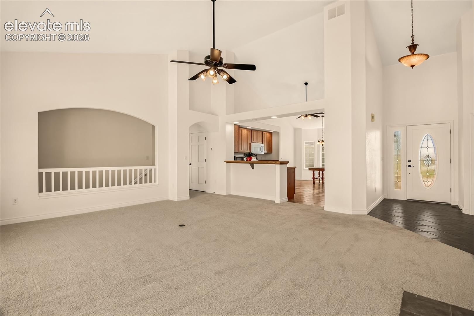  Great Room With Vaulted Ceilings Looking Into The Kitchen. Front Entry To The Right, Office and Guest Bedroom & Bath To The Right, Not In Photo, Master Suite To The Left, Not In The Photo.